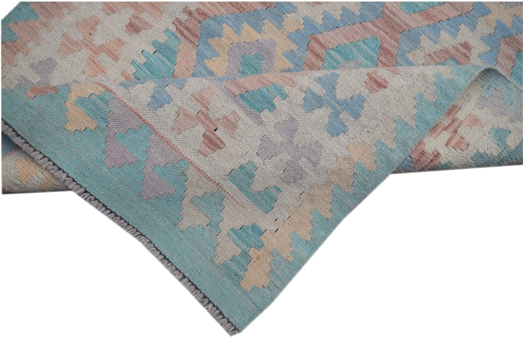 A handmade Afghan Maimana kilim runner featuring a geometric pattern in soft pastel tones.