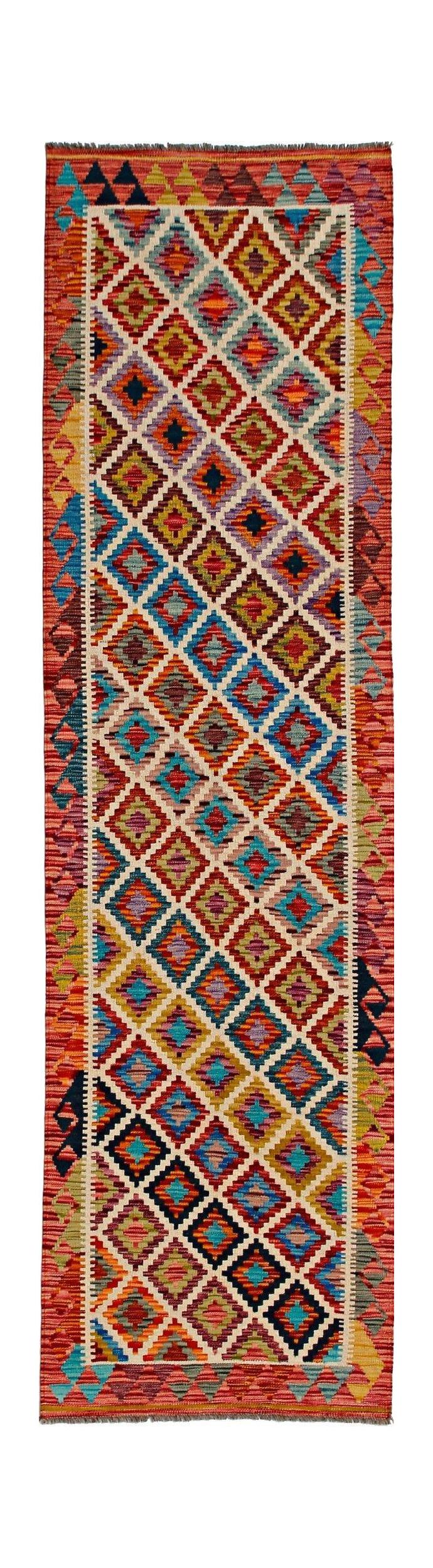 Handwoven Afghan Maimana wool runner featuring a vibrant, multi-colored geometric diamond pattern.