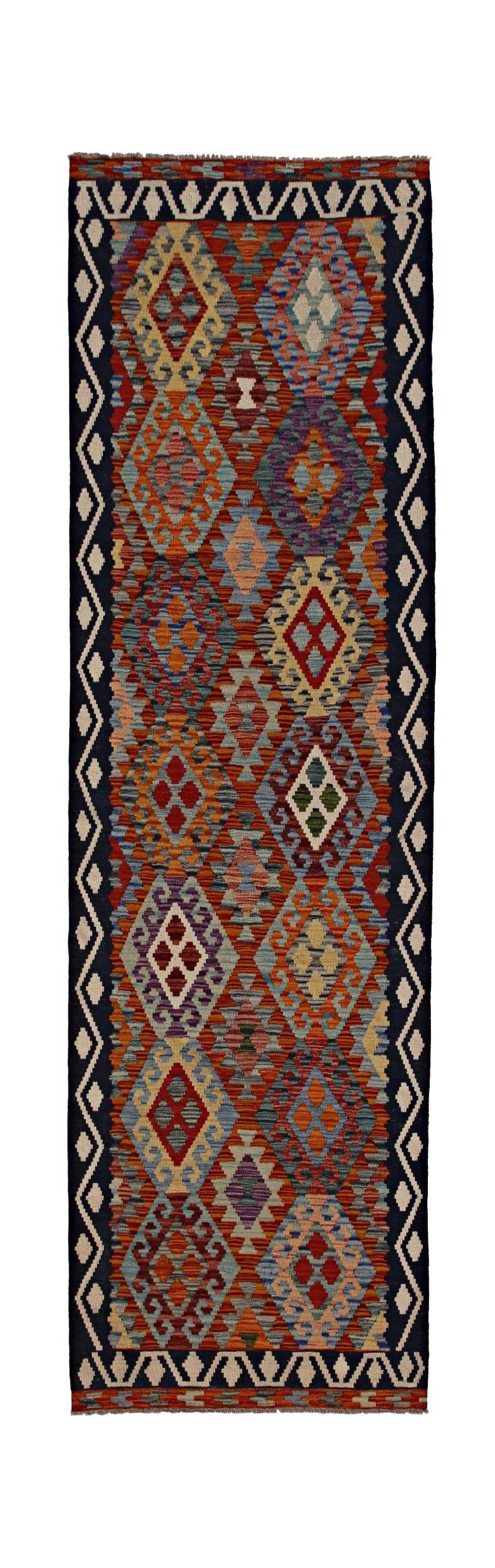 Handwoven Afghan Maimana wool runner rug featuring a colorful geometric diamond pattern.