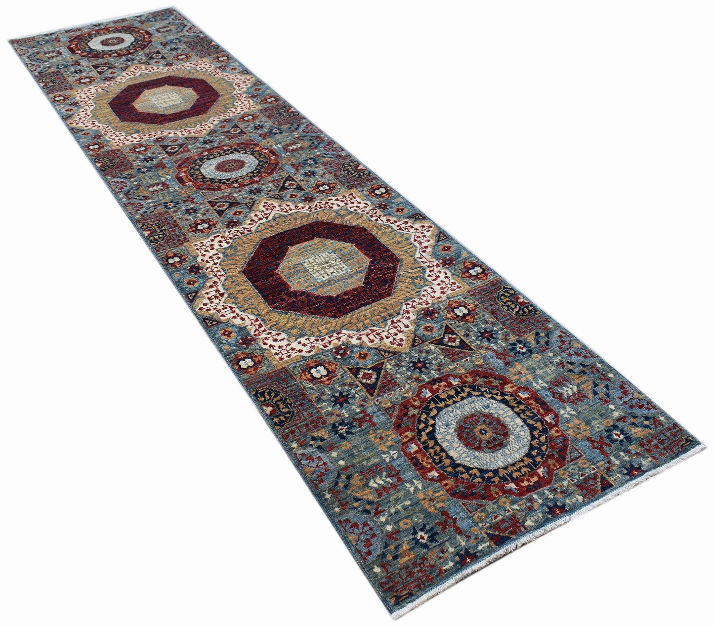 A handmade Afghan Chobi runner rug featuring a traditional Mamluk medallion pattern in blue and red.