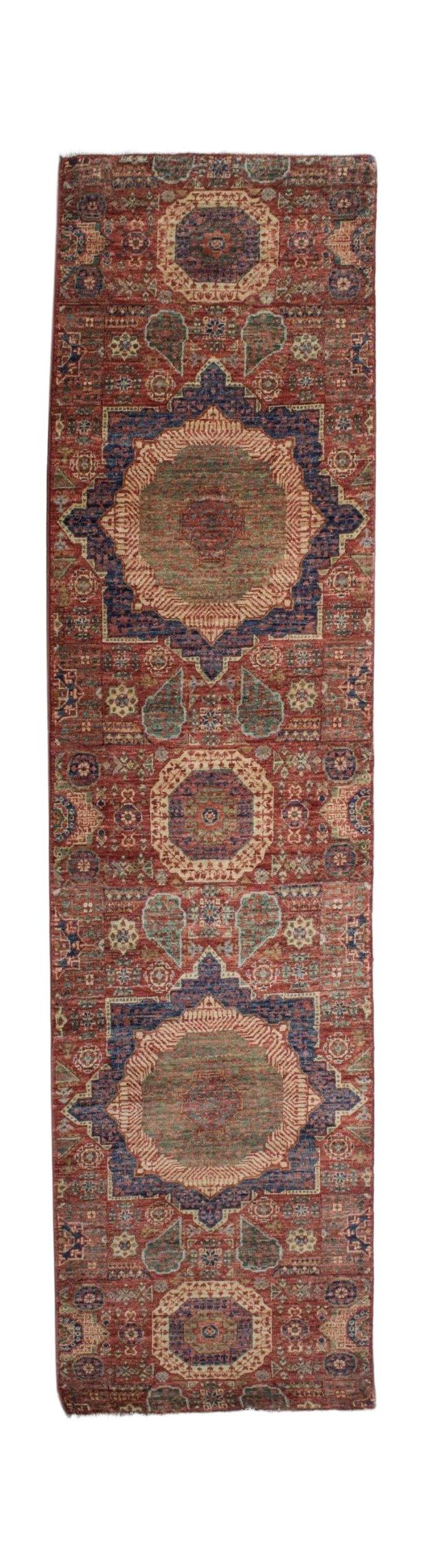 A handmade Afghan Chobi runner rug featuring a traditional Mamluk medallion design in red and blue.