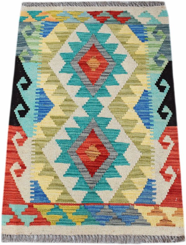 A rectangular handmade Afghan Maimana kilim featuring a colorful geometric diamond pattern.