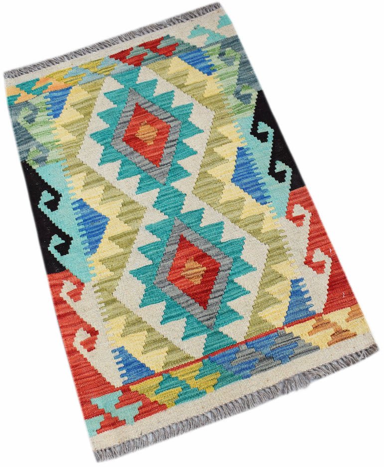A rectangular handmade Afghan Maimana kilim featuring a colorful geometric diamond pattern.