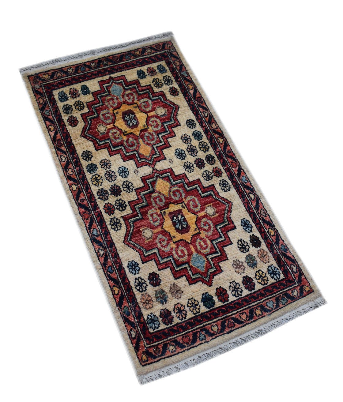 A handmade Afghan Chobi rug featuring two geometric medallions on a cream field with floral motifs.