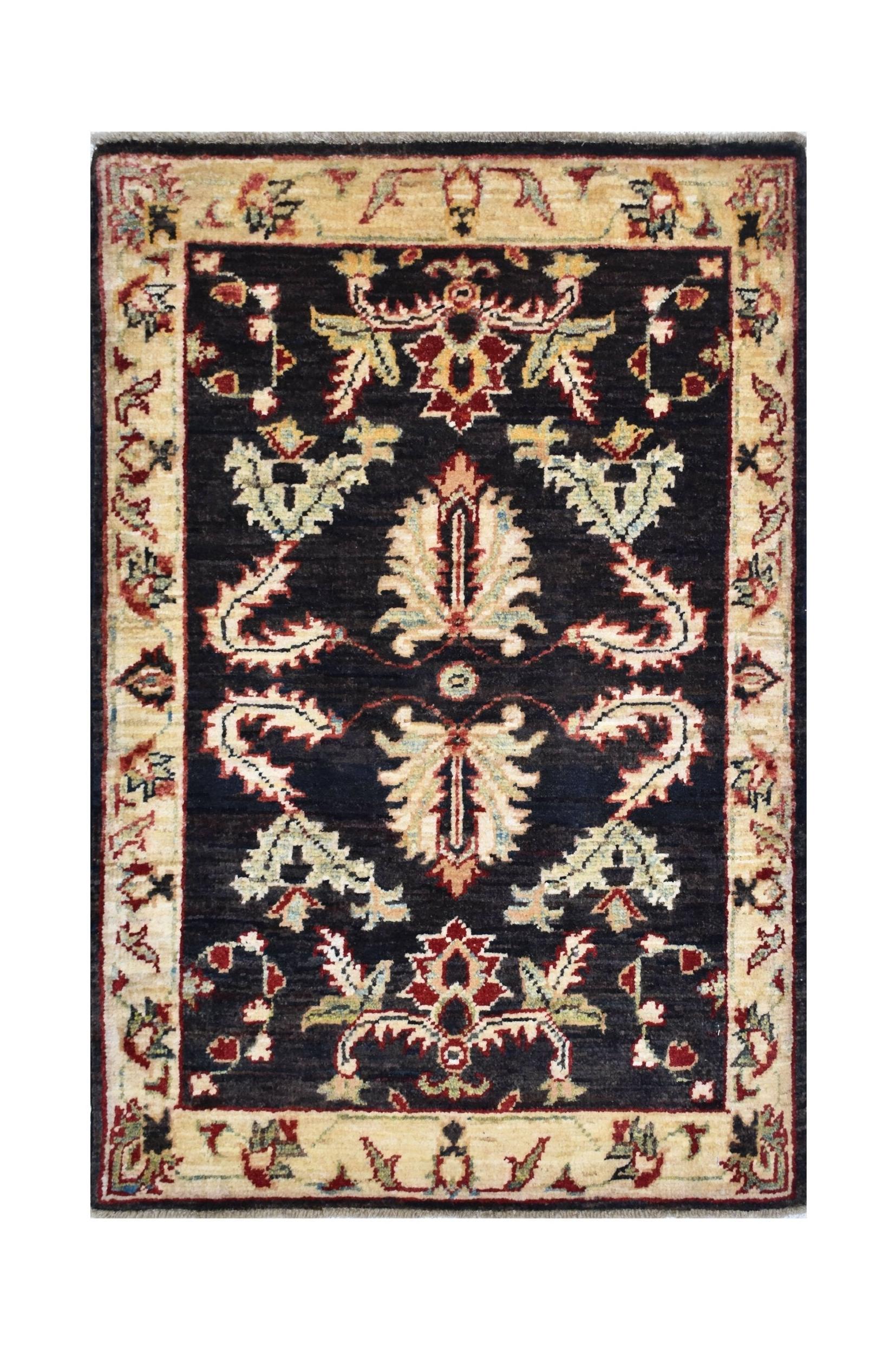 A rectangular handmade Afghan Chobi rug featuring a dark field with traditional floral motifs.