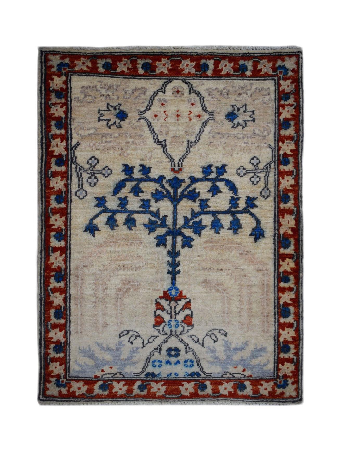 A handmade Afghan Chobi rug featuring a central blue tree motif on a cream field with red borders.