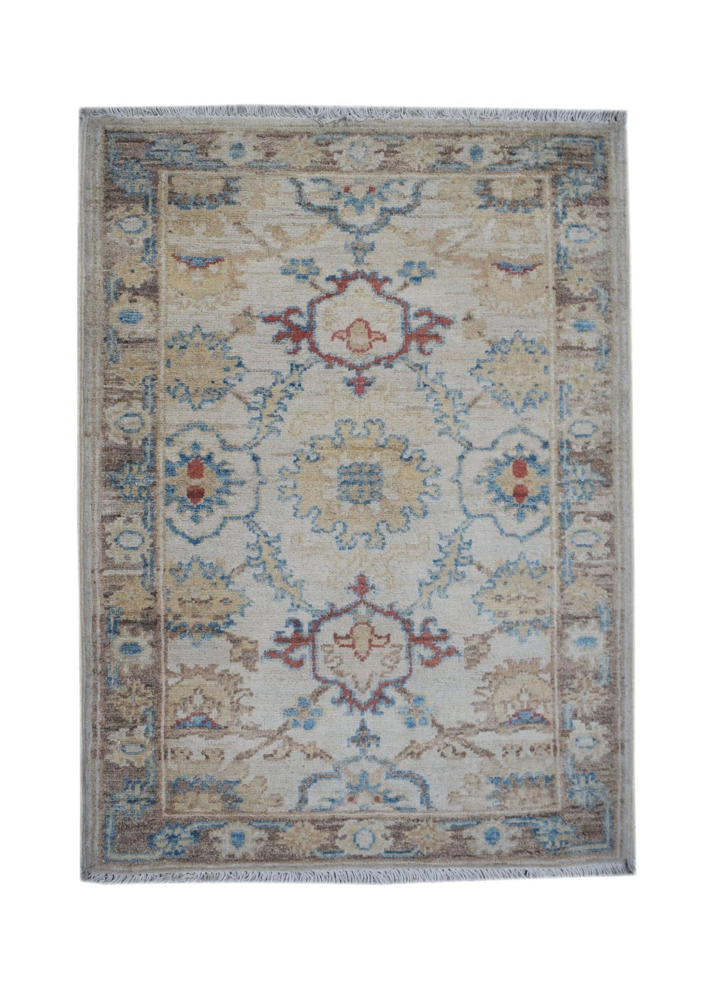 A handmade Afghan Chobi rug featuring a traditional floral pattern in beige, blue, and red tones.