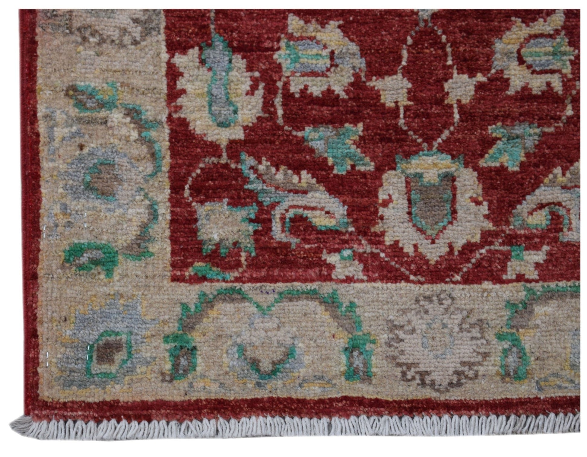 A handmade Afghan Chobi rug featuring a red field with floral patterns and a beige border.