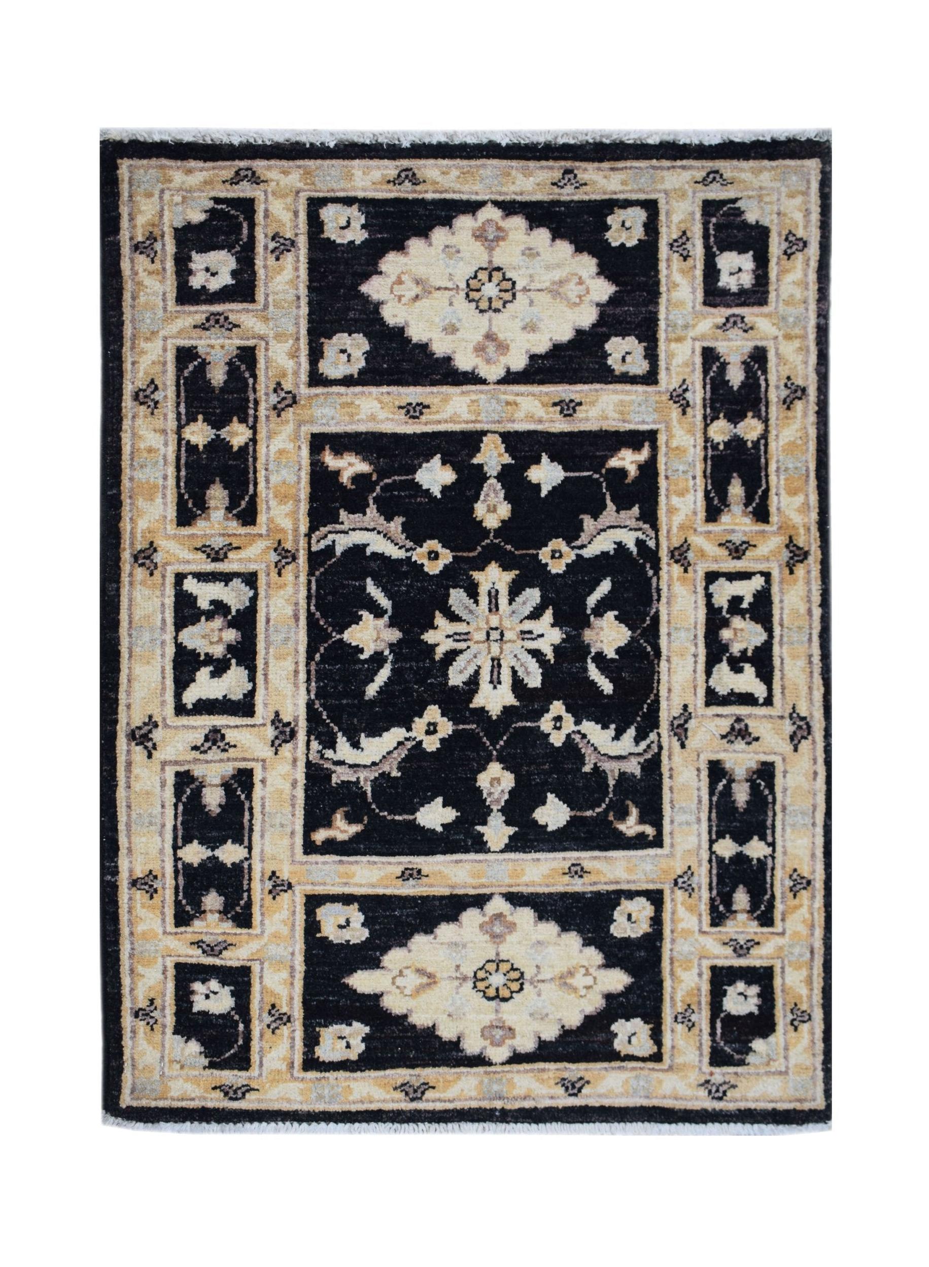 A handmade Afghan Chobi rug featuring a black central medallion and floral patterns in beige.