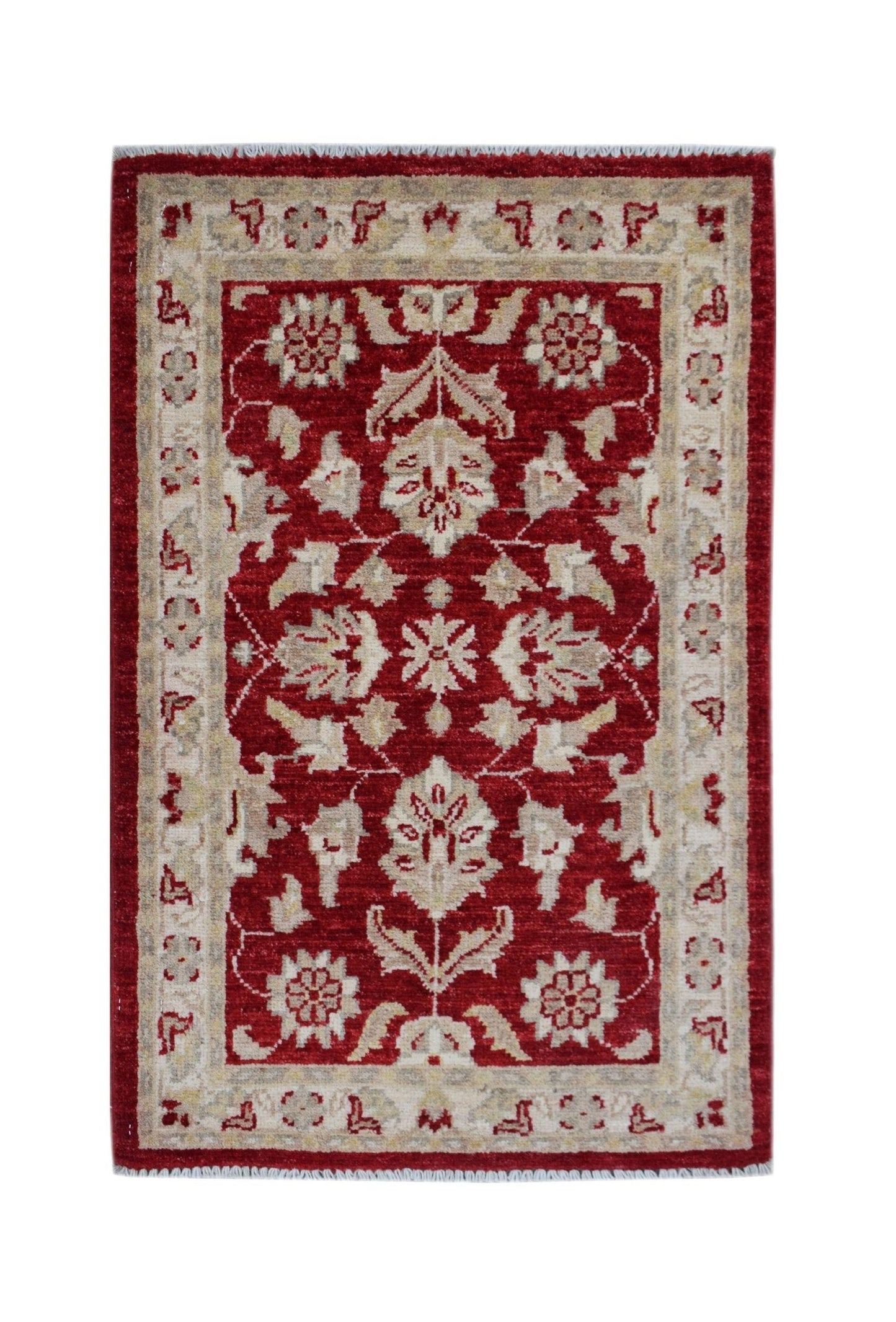 A rectangular handmade Afghan Chobi rug featuring a floral pattern in red and beige wool.