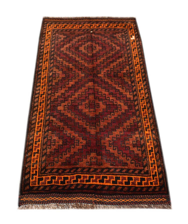 A vintage handmade Afghan Baluch rug featuring a geometric diamond pattern in red and orange tones.