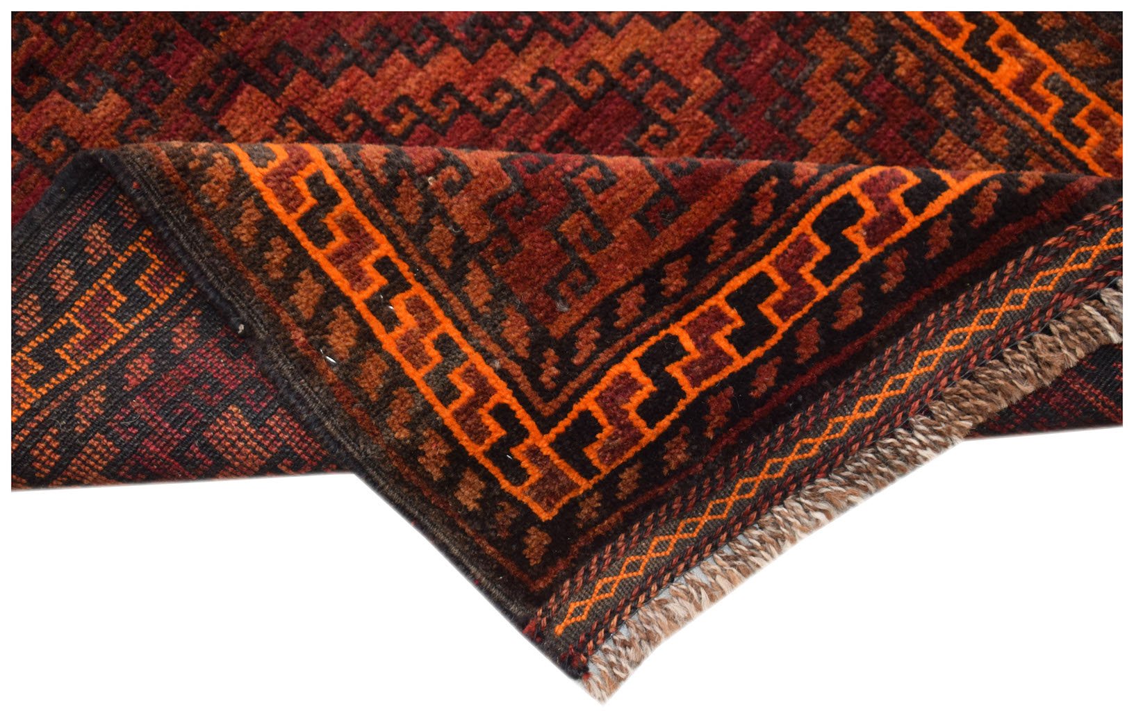 A vintage Afghan Baluch rug with a geometric pattern in shades of red, orange, and black.