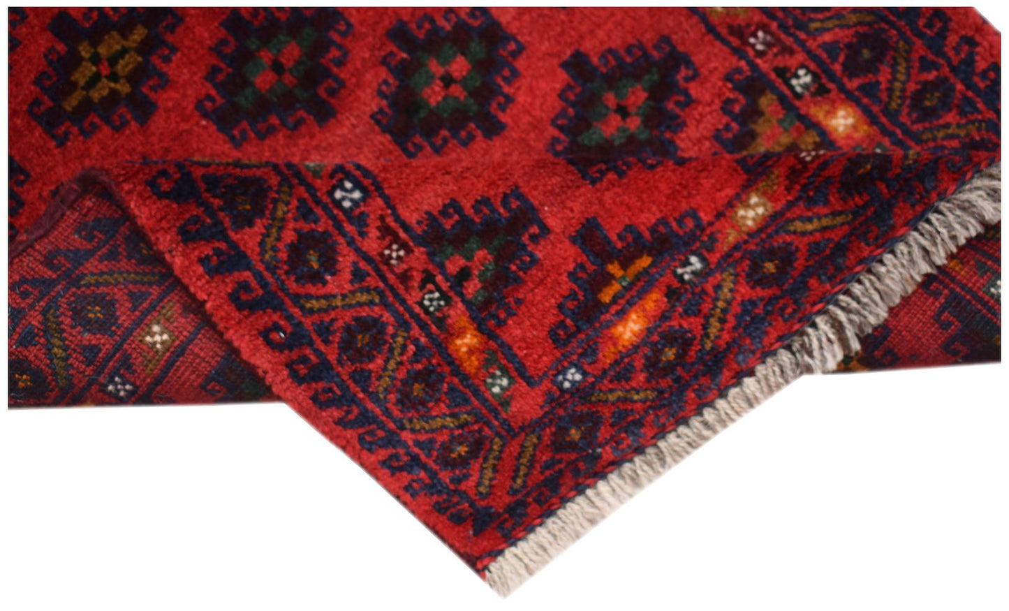A vintage handmade Afghan Baluch wool rug featuring a red field with dark geometric patterns.