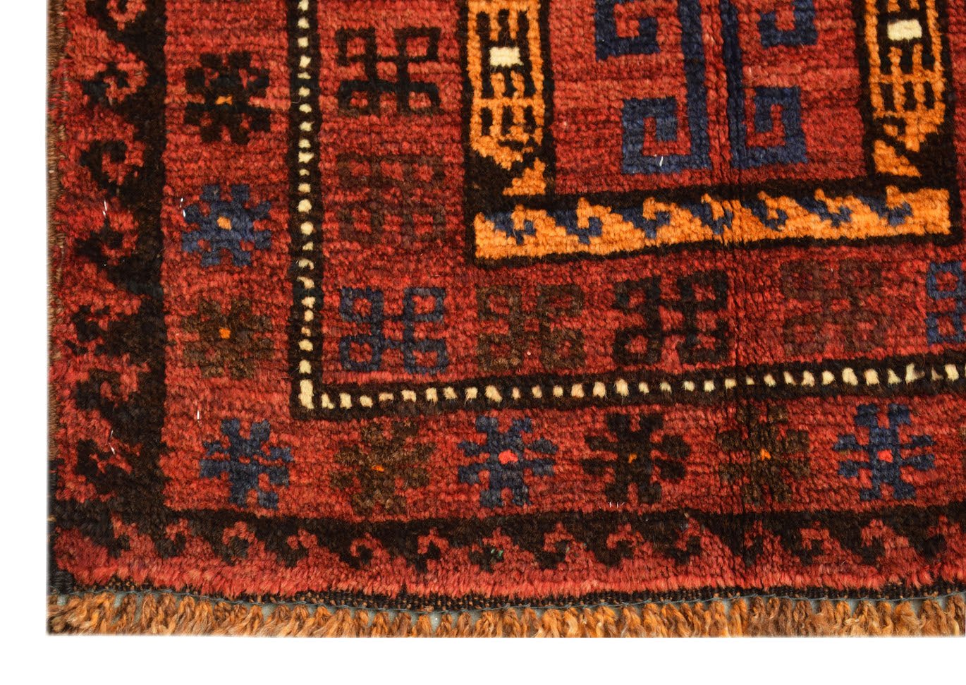 Vintage Afghan Baluch rug with red, blue, and orange geometric patterns.