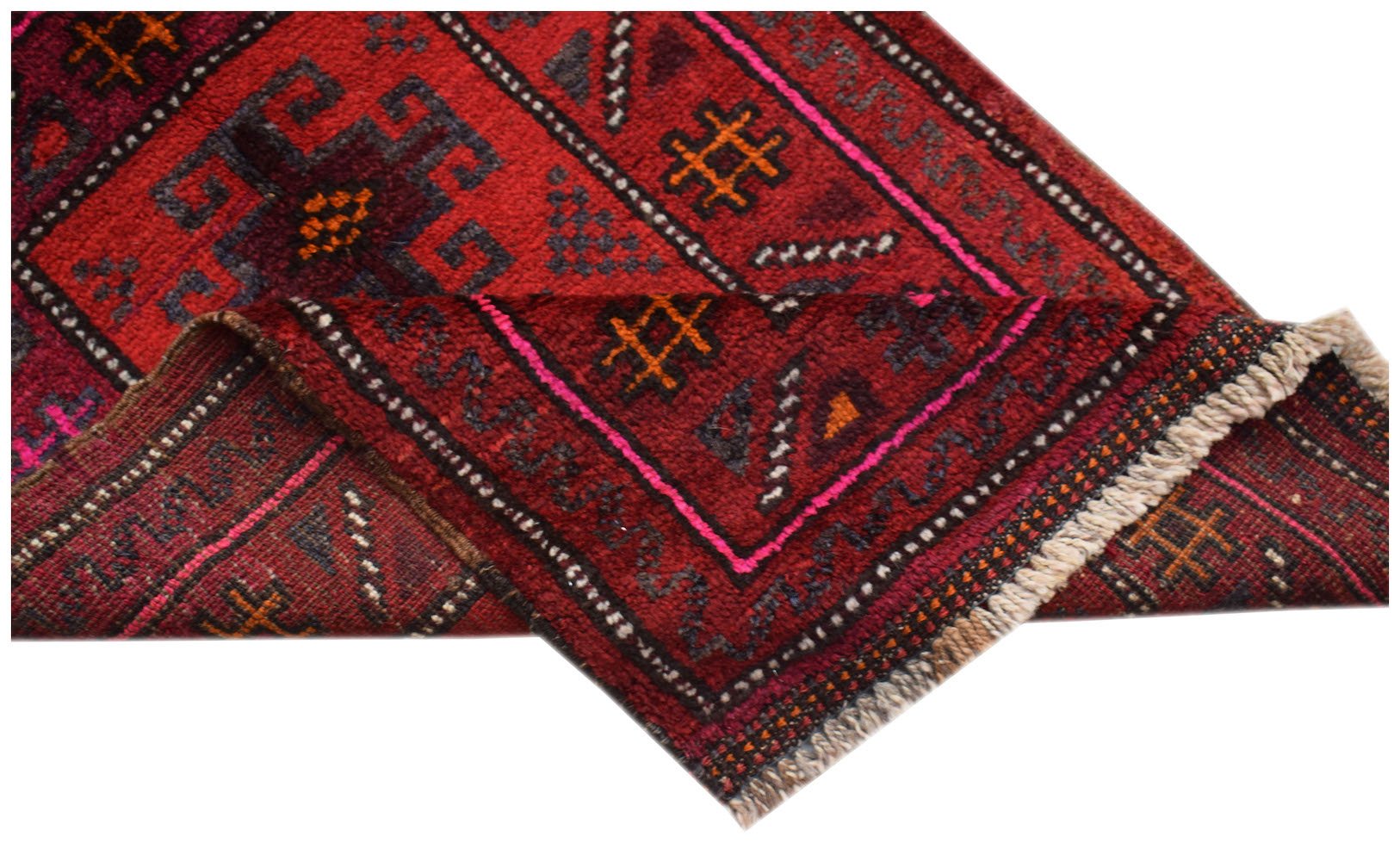A vintage handmade Afghan Baluch rug featuring geometric tribal patterns in deep red and blue tones.