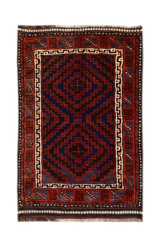 A handmade vintage Afghan Baluch rug featuring geometric diamond patterns in red, blue, and brown.
