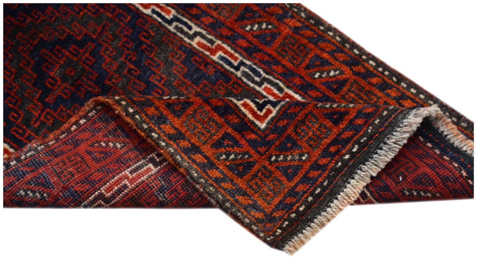 A vintage handmade Afghan Baluch rug featuring geometric patterns in dark red, blue, and brown.