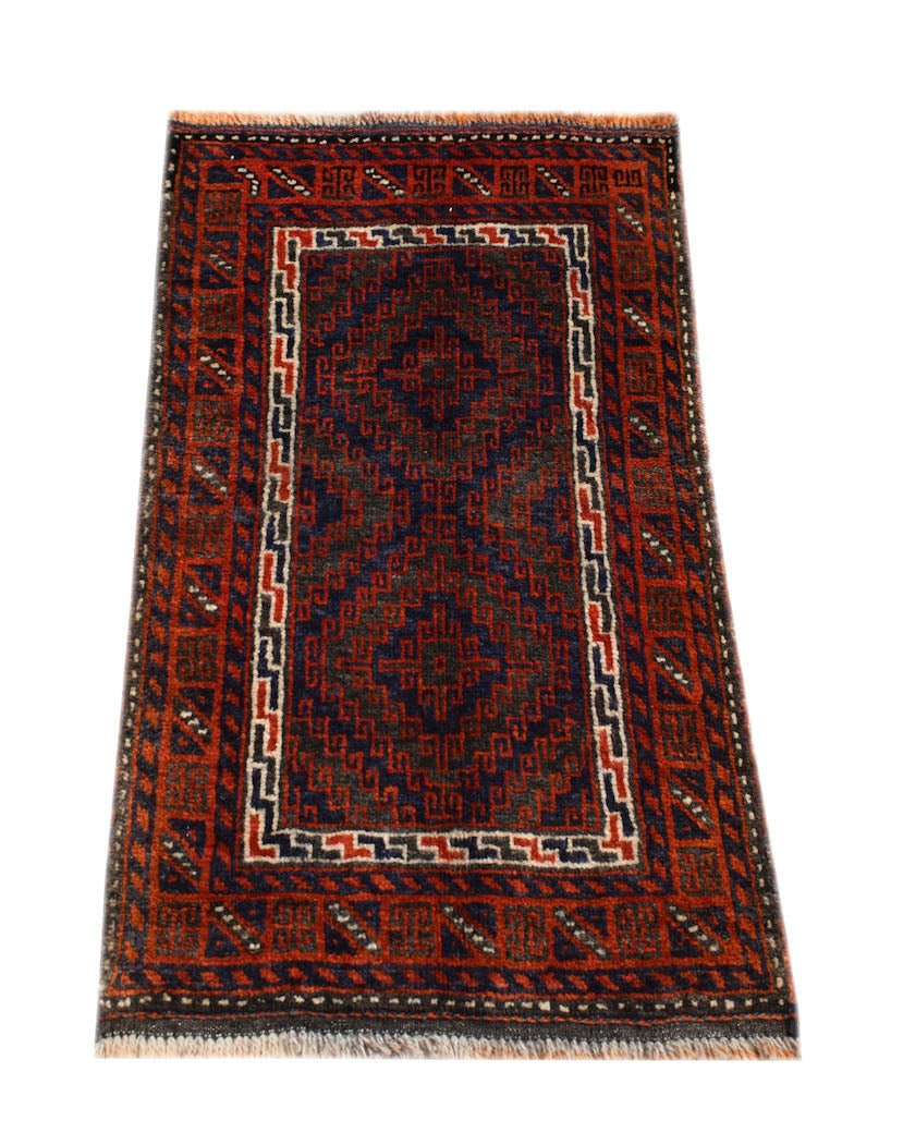 A handmade vintage Afghan Baluch rug featuring geometric diamond patterns in red, blue, and brown.