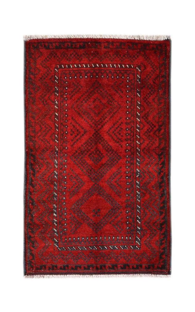 A vintage handmade Afghan Baluch rug featuring a deep red field with dark geometric diamond motifs.