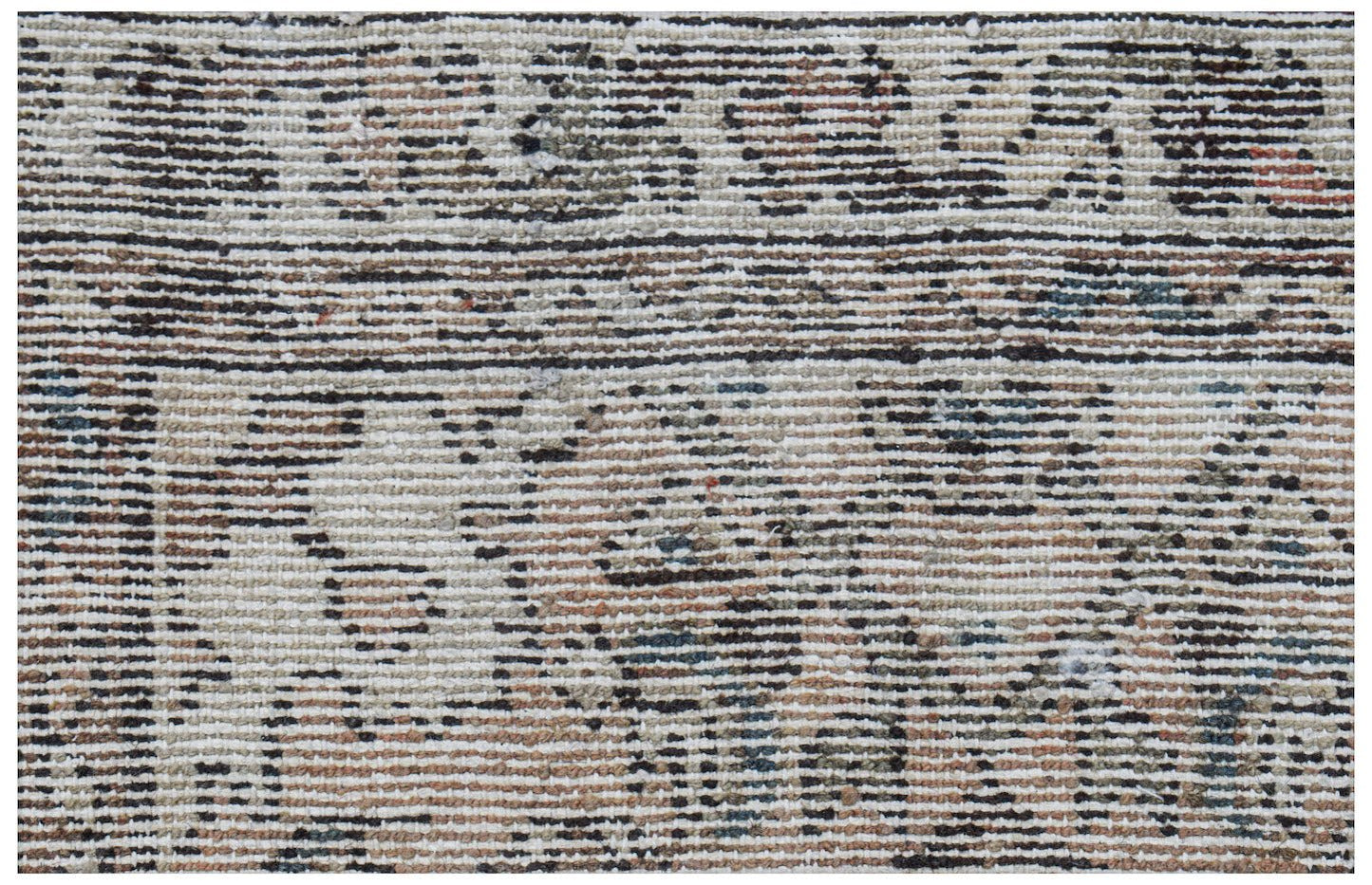 Mini vintage Persian rug with a distressed pattern in neutral tones.