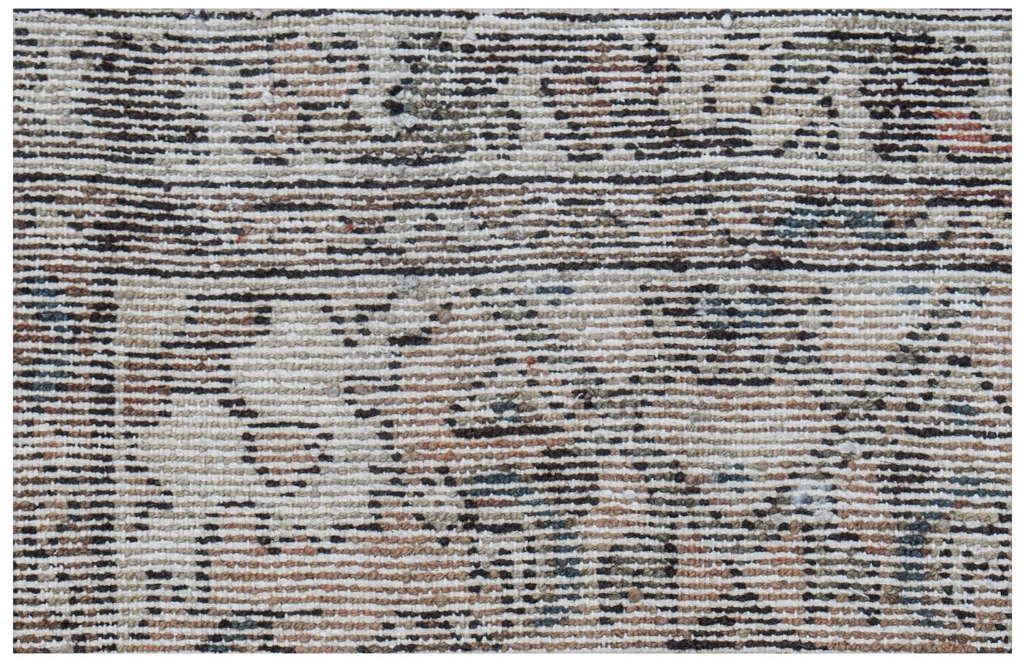 Mini vintage Persian rug with a distressed pattern in neutral tones.
