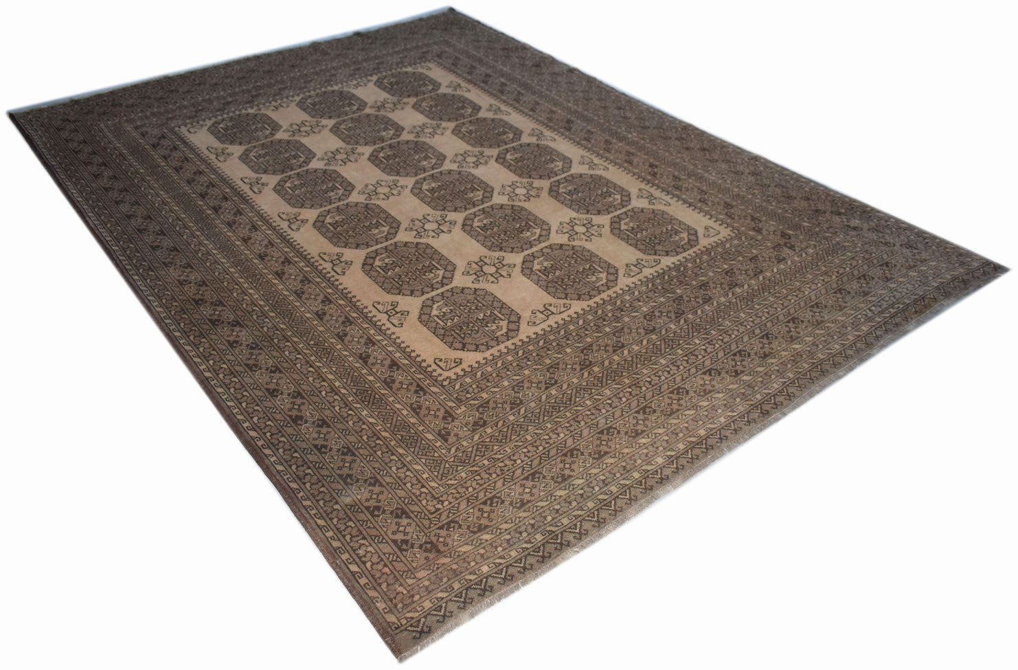 A vintage handmade Afghan Turkmen rug featuring repeating octagonal motifs in brown and beige tones.