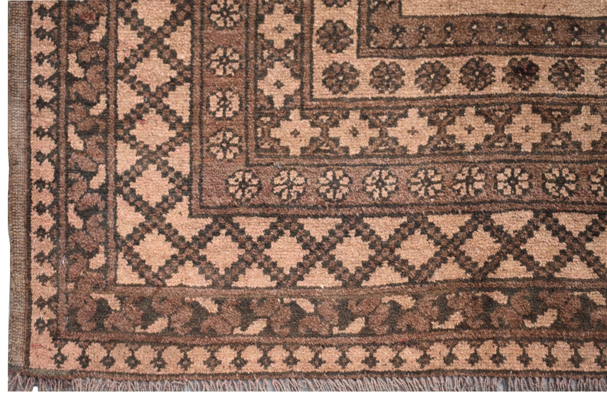 A vintage Afghan Turkmen rug featuring a geometric diamond pattern in shades of brown and tan.