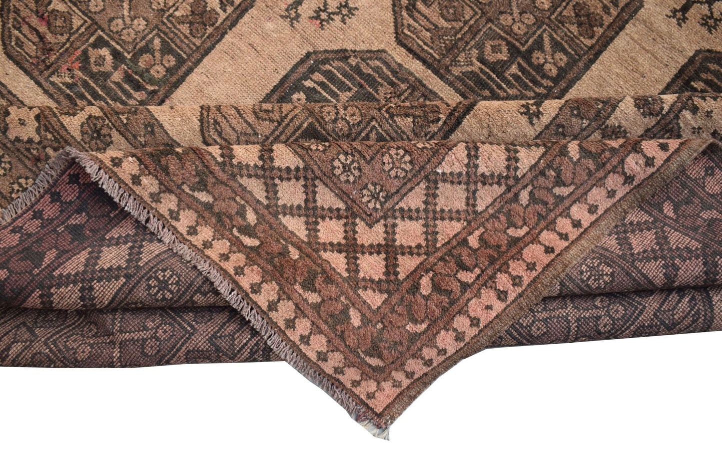 A vintage handmade Afghan Turkmen wool rug featuring geometric patterns in shades of brown.