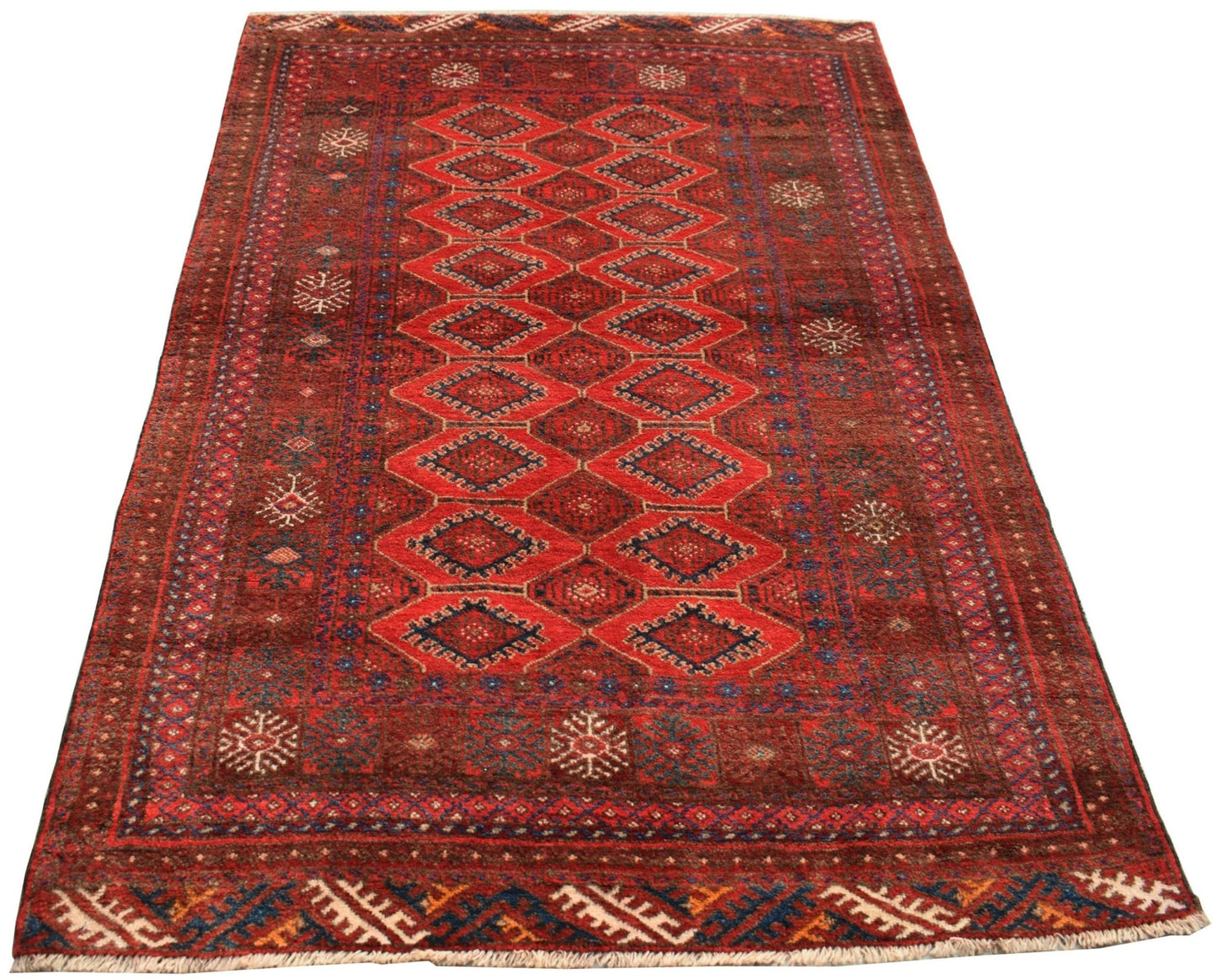 A vintage handmade Afghan Baluch rug featuring a repeating diamond pattern in deep red tones.