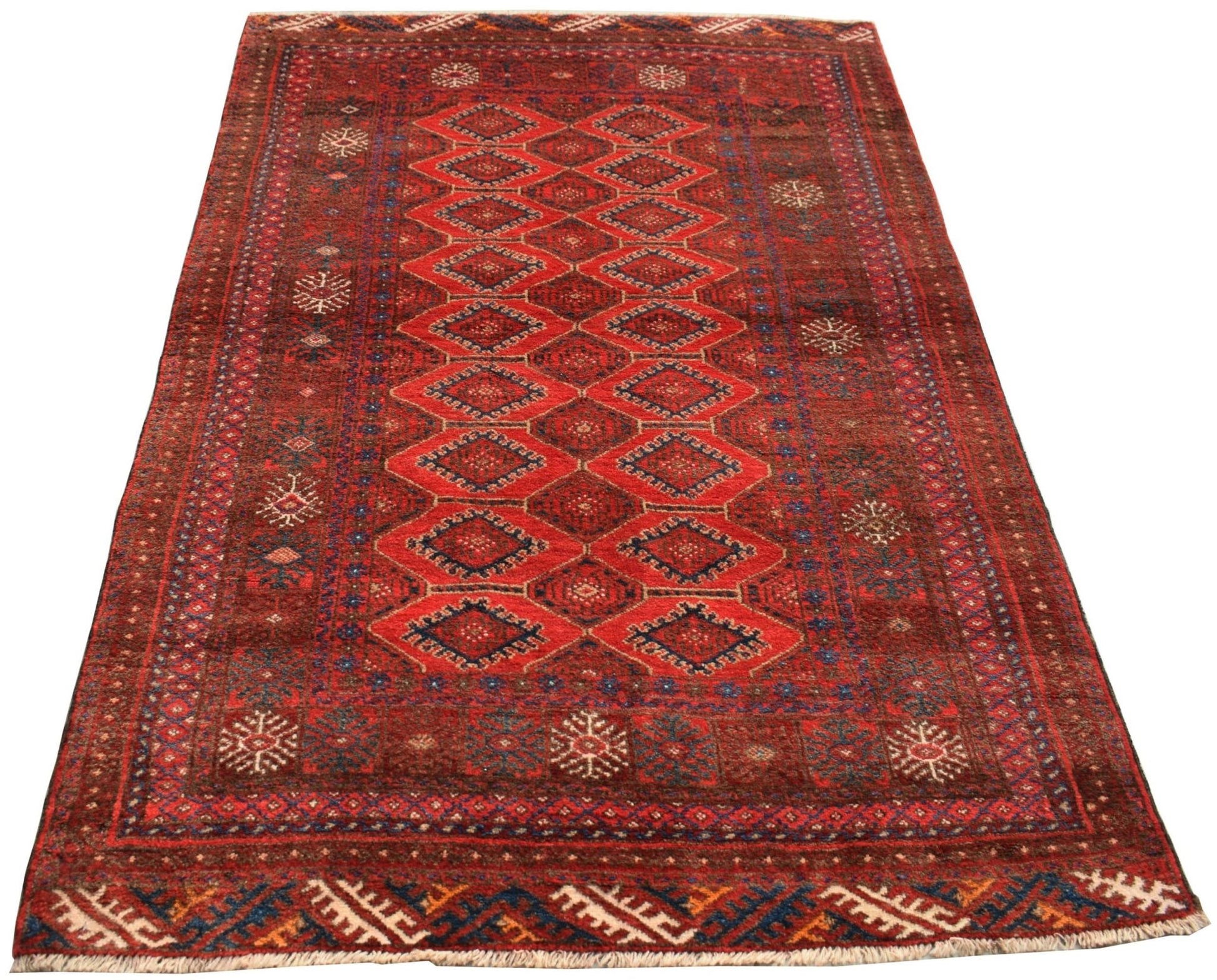 A vintage handmade Afghan Baluch rug featuring a repeating diamond pattern in deep red tones.