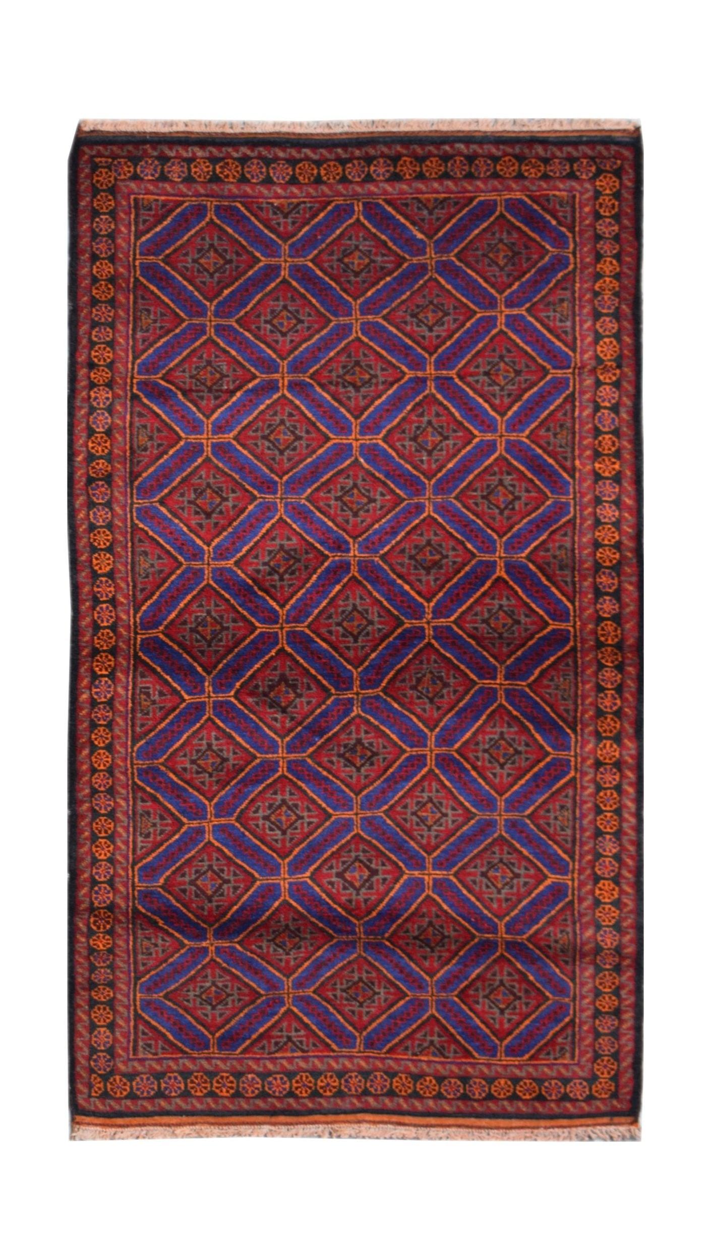 A vintage Afghan Baluch rug featuring a repeating diamond pattern in red, blue, and orange tones.