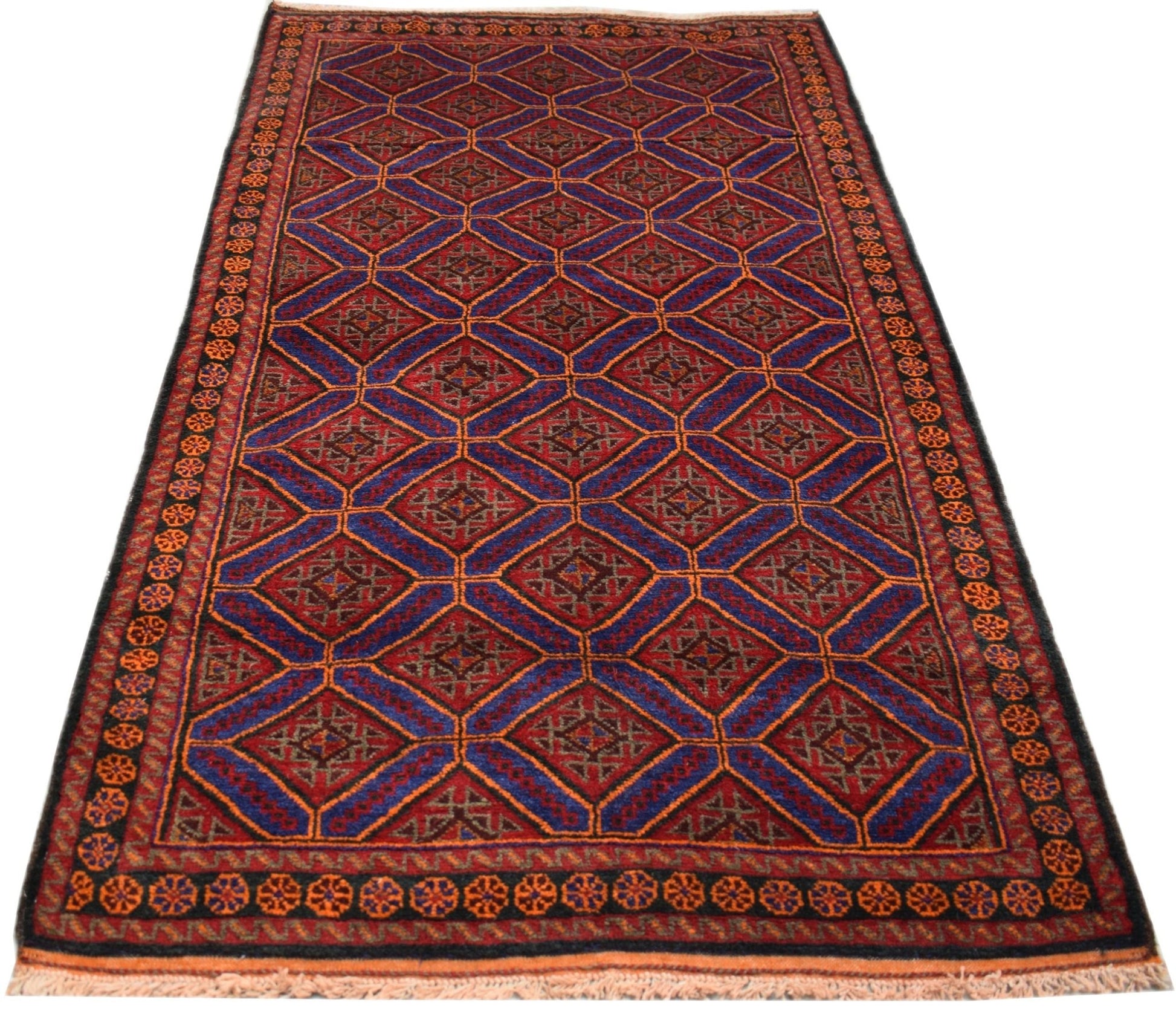 A vintage handmade Afghan Baluch rug featuring a repeating diamond pattern in red and blue tones.