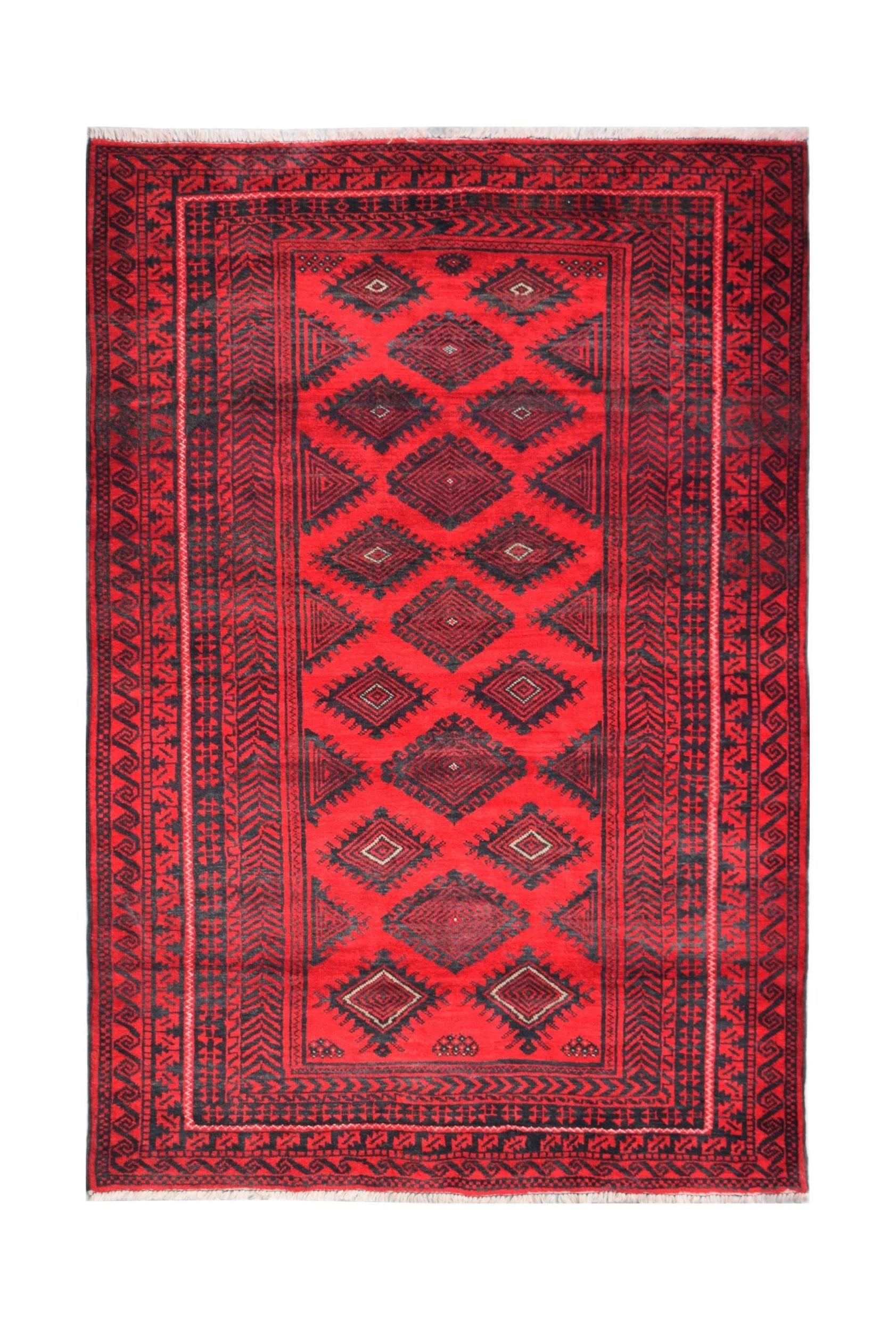 A vintage Afghan Baluch rug featuring a geometric diamond pattern in deep red and black wool.