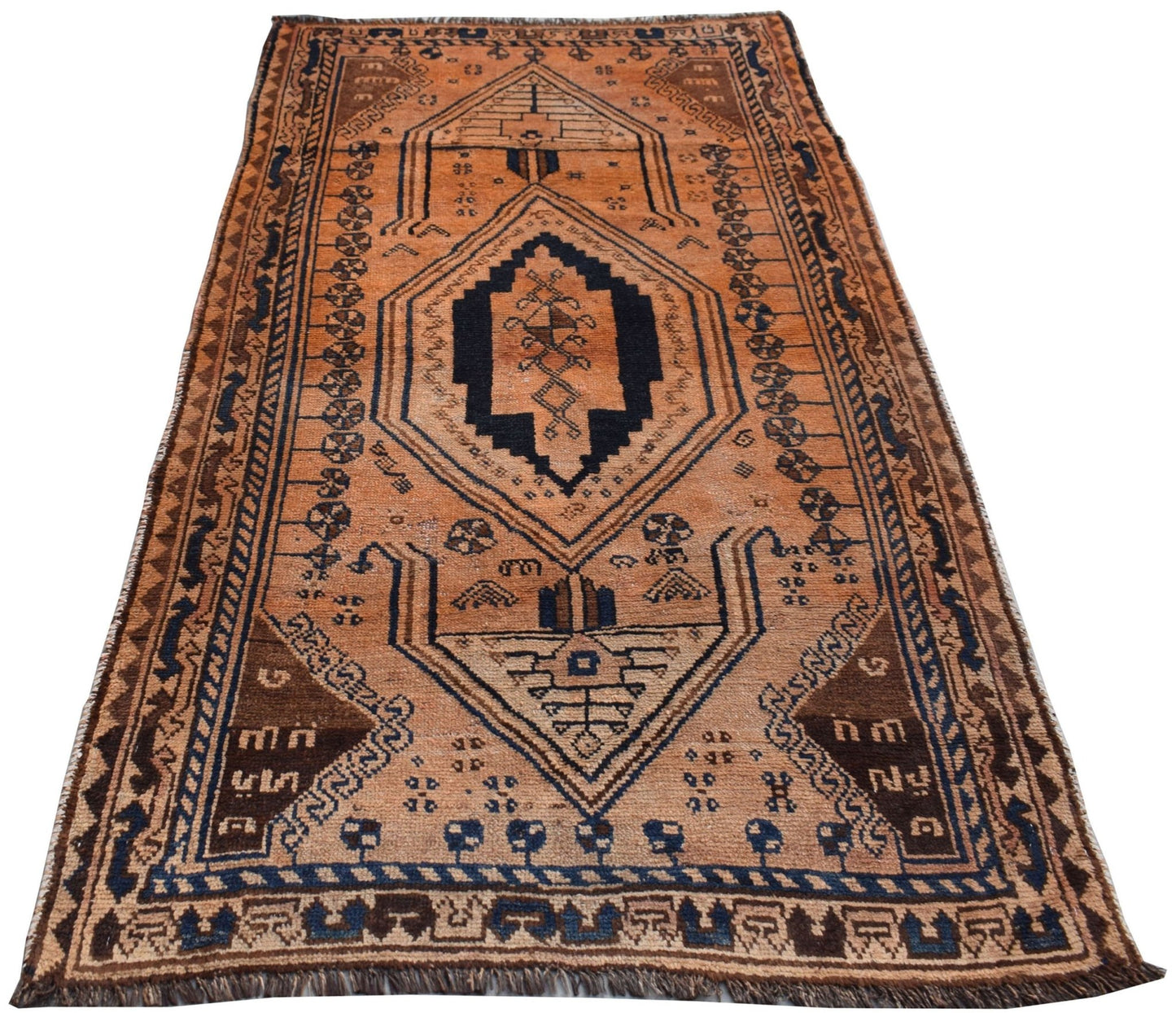 A vintage Afghan Baluch wool rug featuring a geometric diamond pattern in orange and dark blue.
