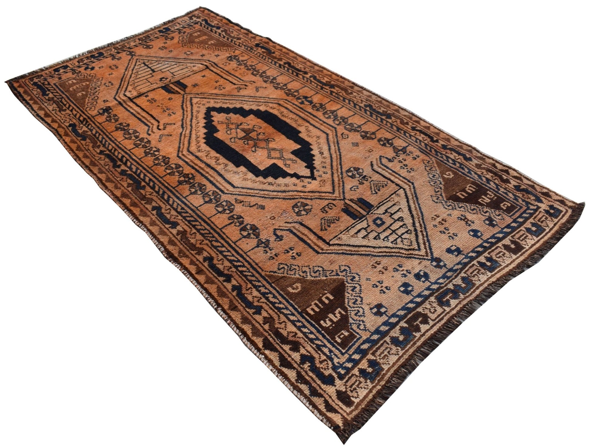 A vintage handmade Afghan Baluch wool rug featuring a geometric tribal pattern in brown and blue.