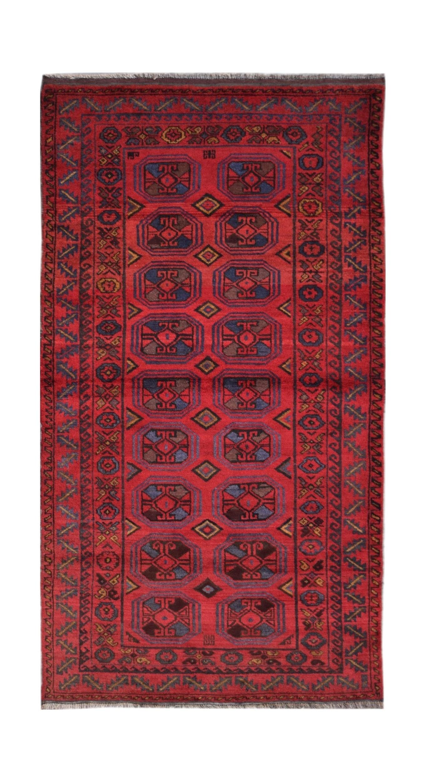 A vintage handmade Afghan Baluch rug featuring a repeating geometric pattern in deep red tones.