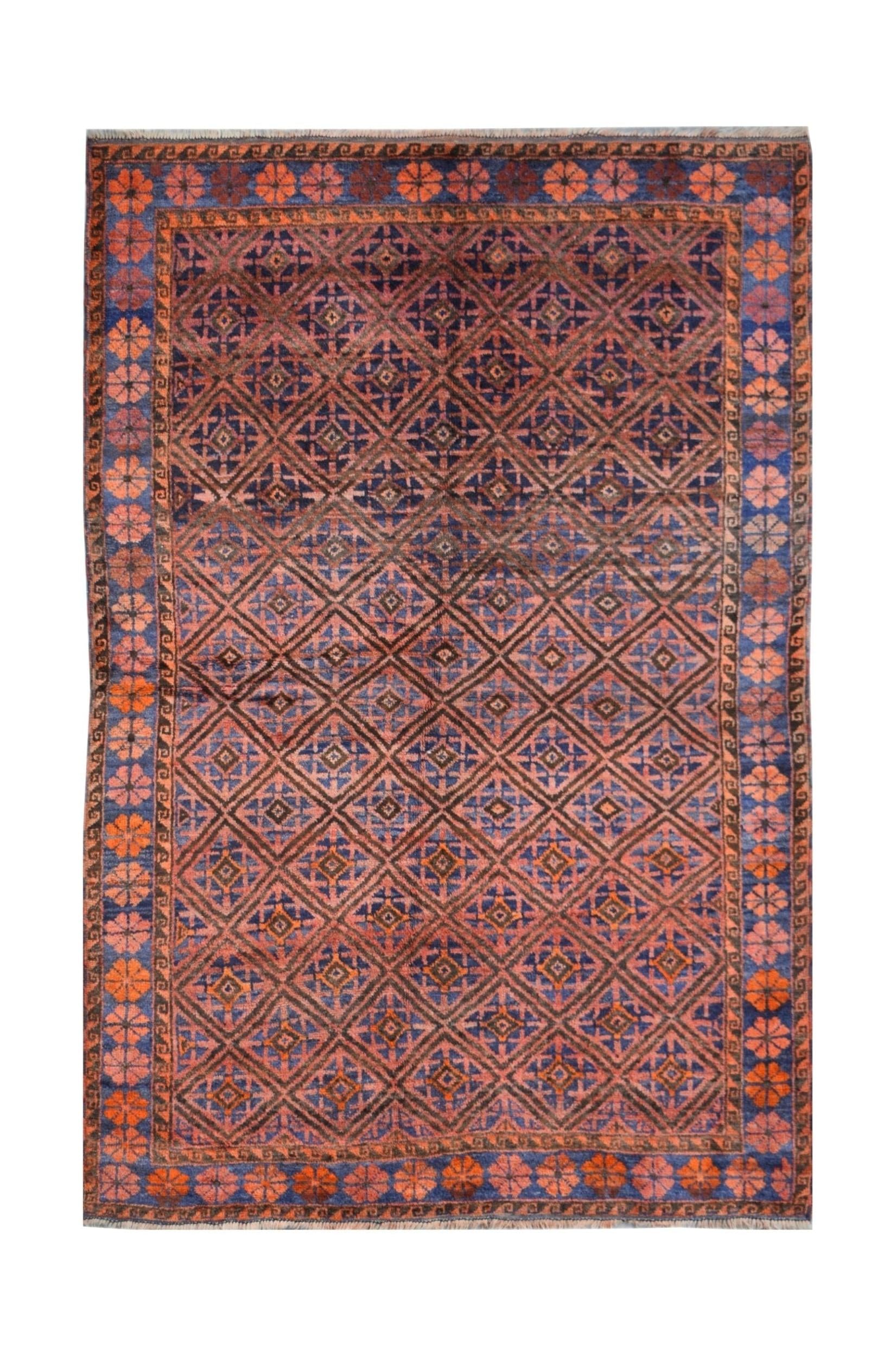 A vintage Afghan Baluch rug featuring a repeating diamond pattern in shades of blue and orange.