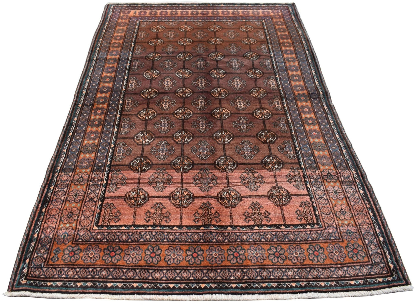 A vintage handmade Afghan Baluch rug featuring a geometric pattern in shades of brown and rust.