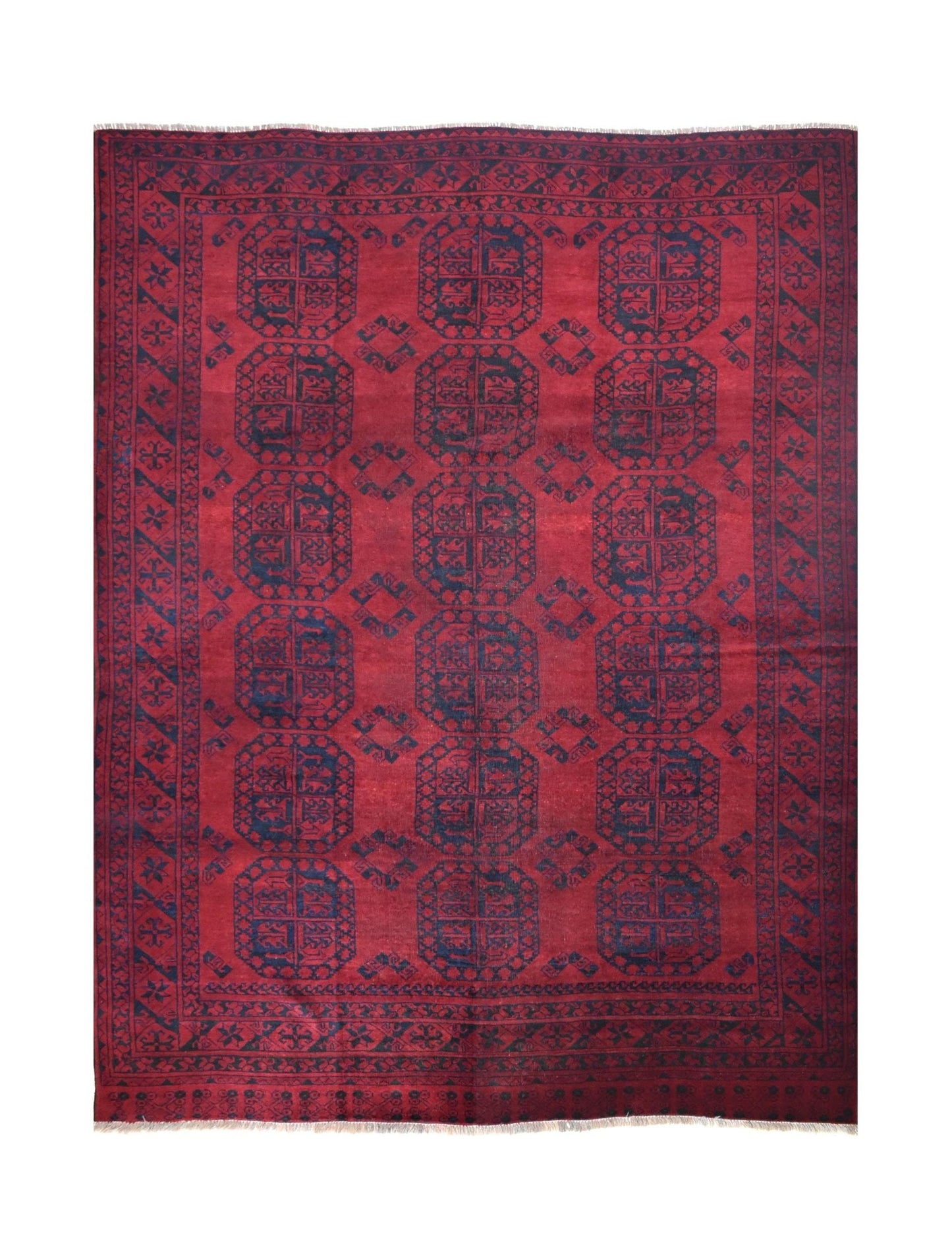 A vintage handmade Afghan Turkmen rug featuring a deep red field with repeating geometric motifs.