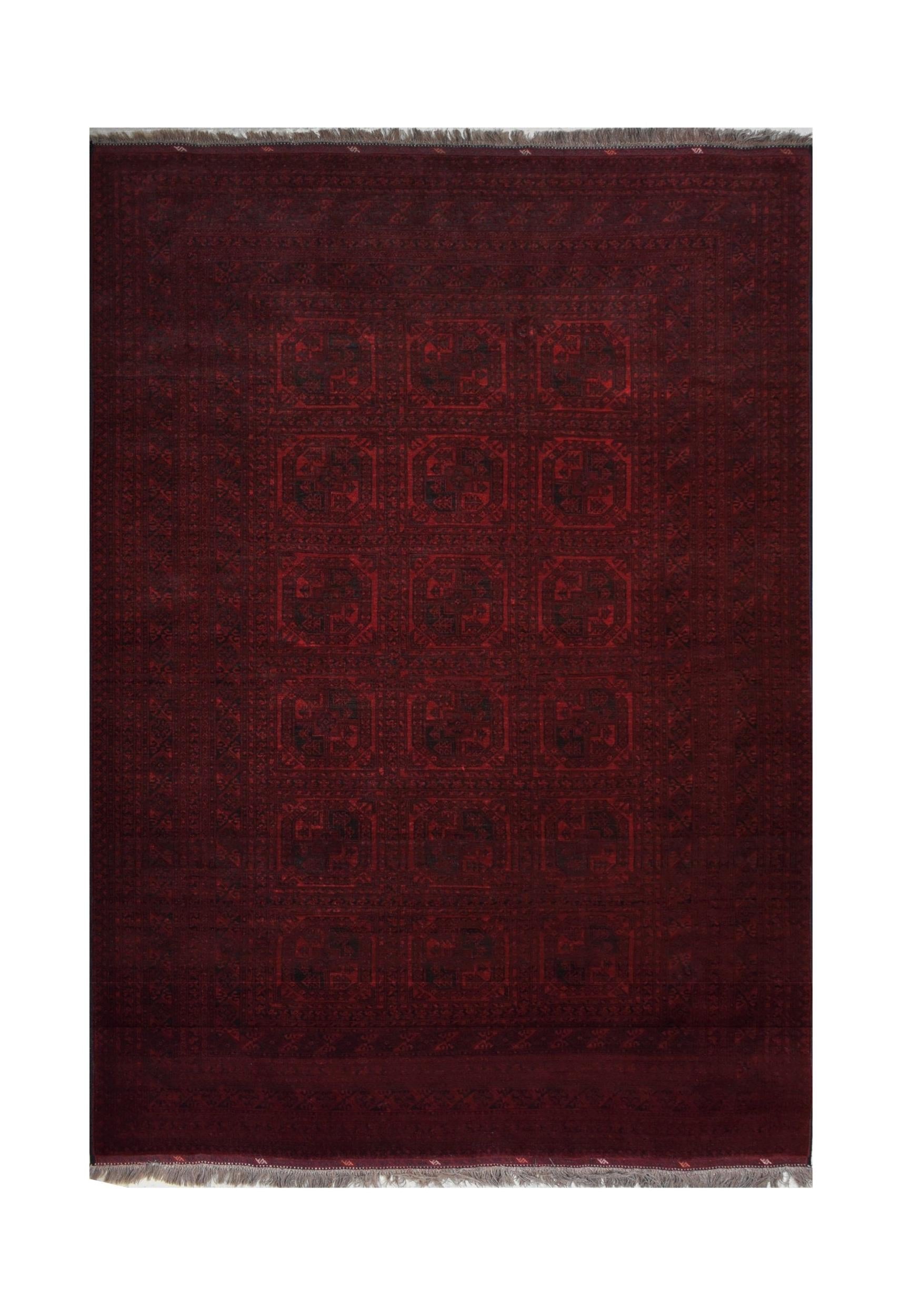 A vintage handmade Afghan Turkmen rug featuring a deep red field with repeating geometric motifs.