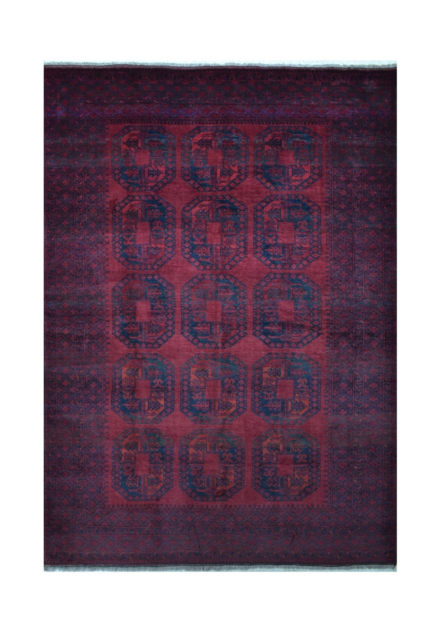 A vintage handmade Afghan Turkmen rug featuring a deep red field with repeating geometric motifs.