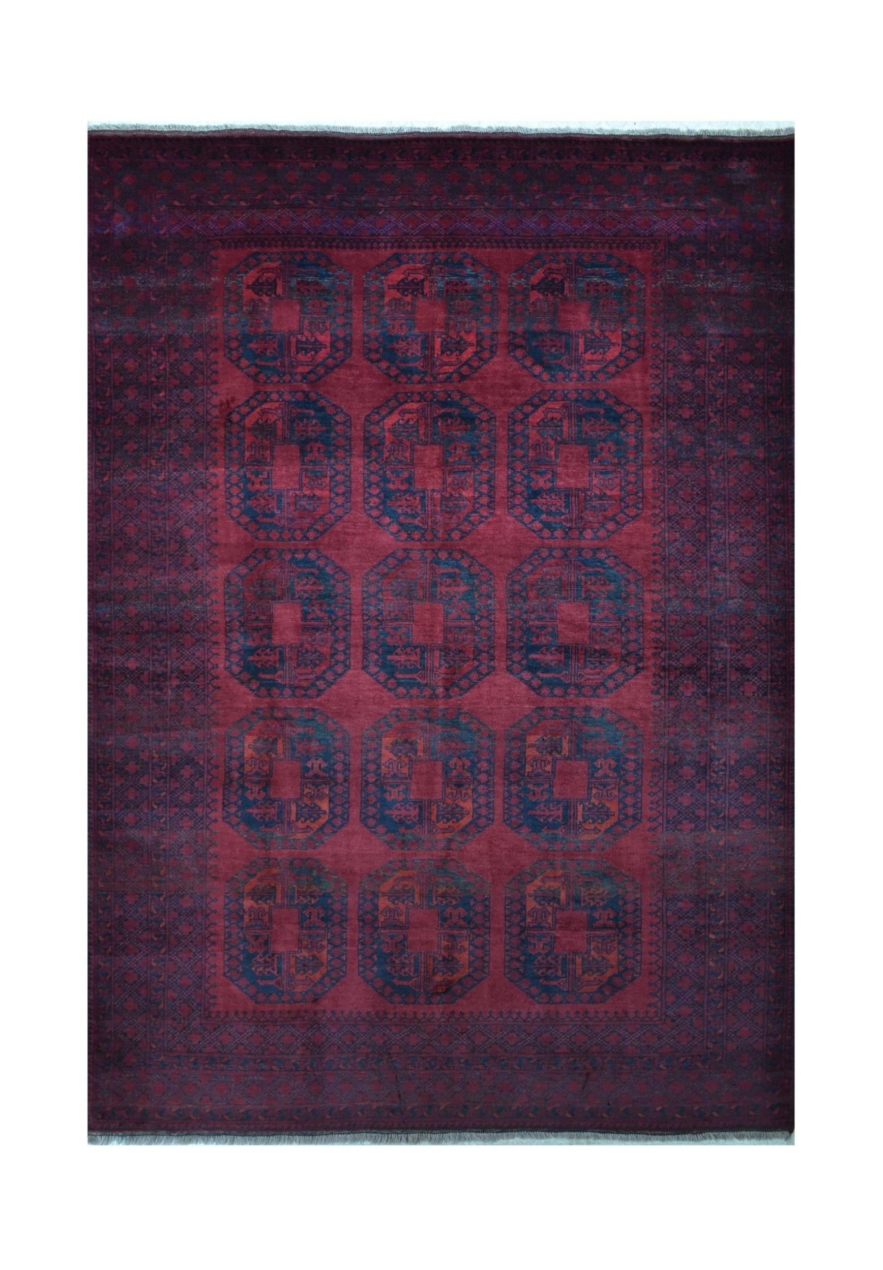A vintage handmade Afghan Turkmen rug featuring a deep red field with repeating geometric motifs.