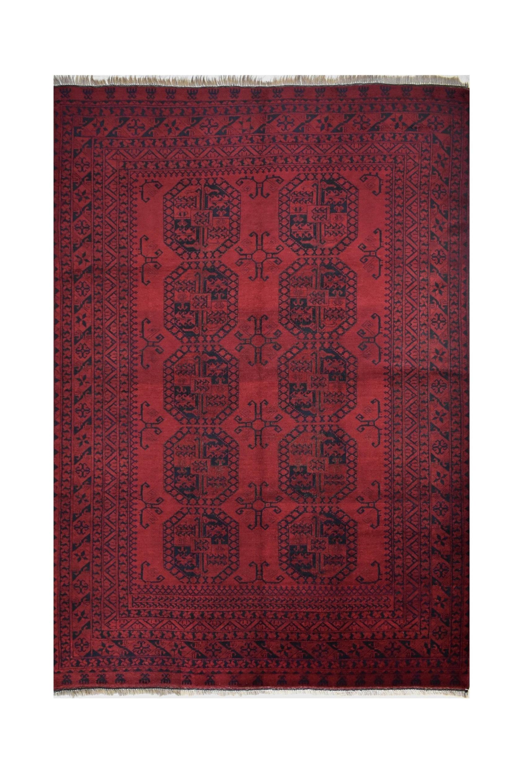 A vintage handmade Afghan Turkmen rug featuring geometric patterns in deep red and black wool.