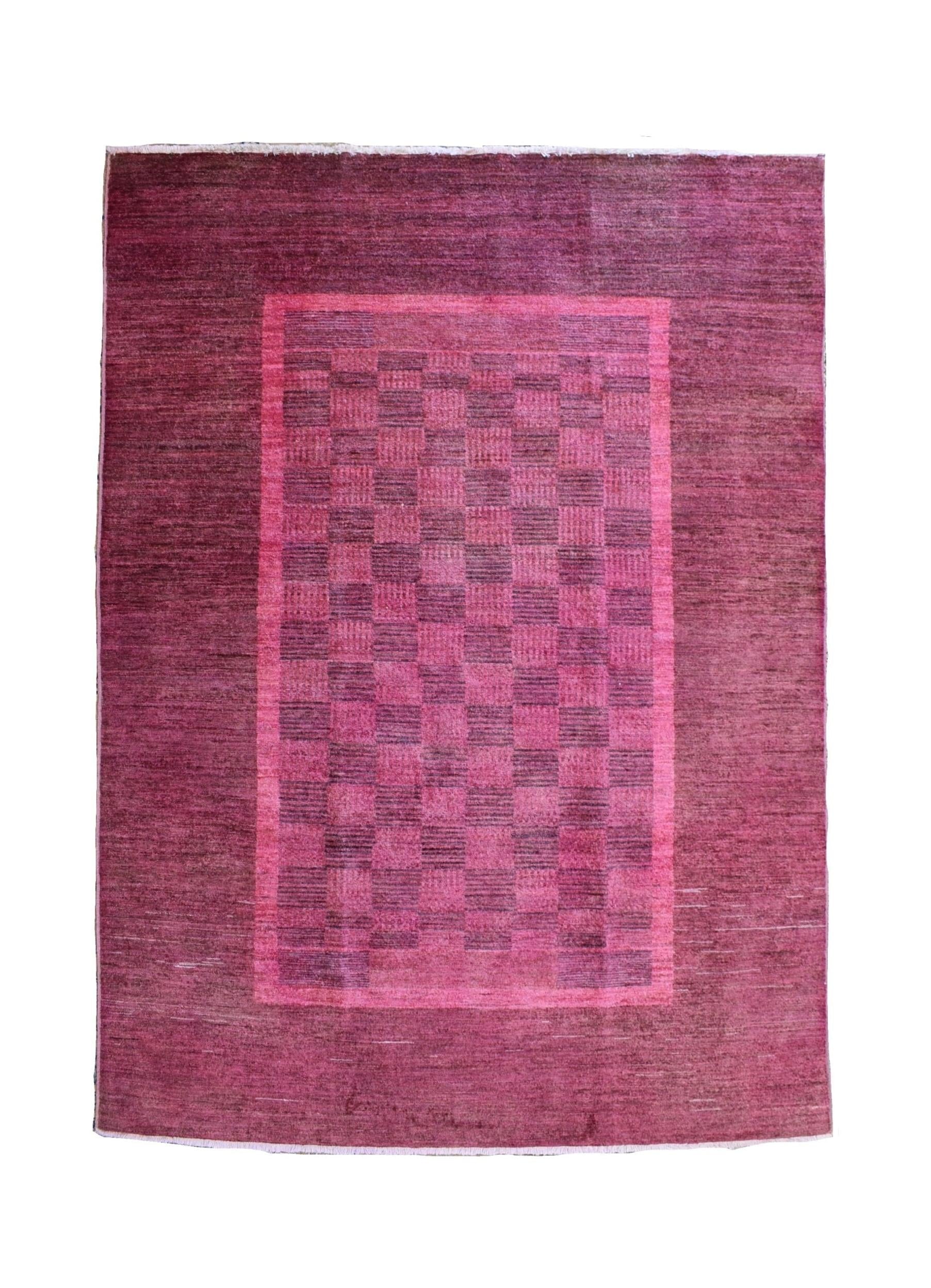 A rectangular, handmade Afghan Chobi rug featuring an overdyed magenta and pink checkerboard pattern.