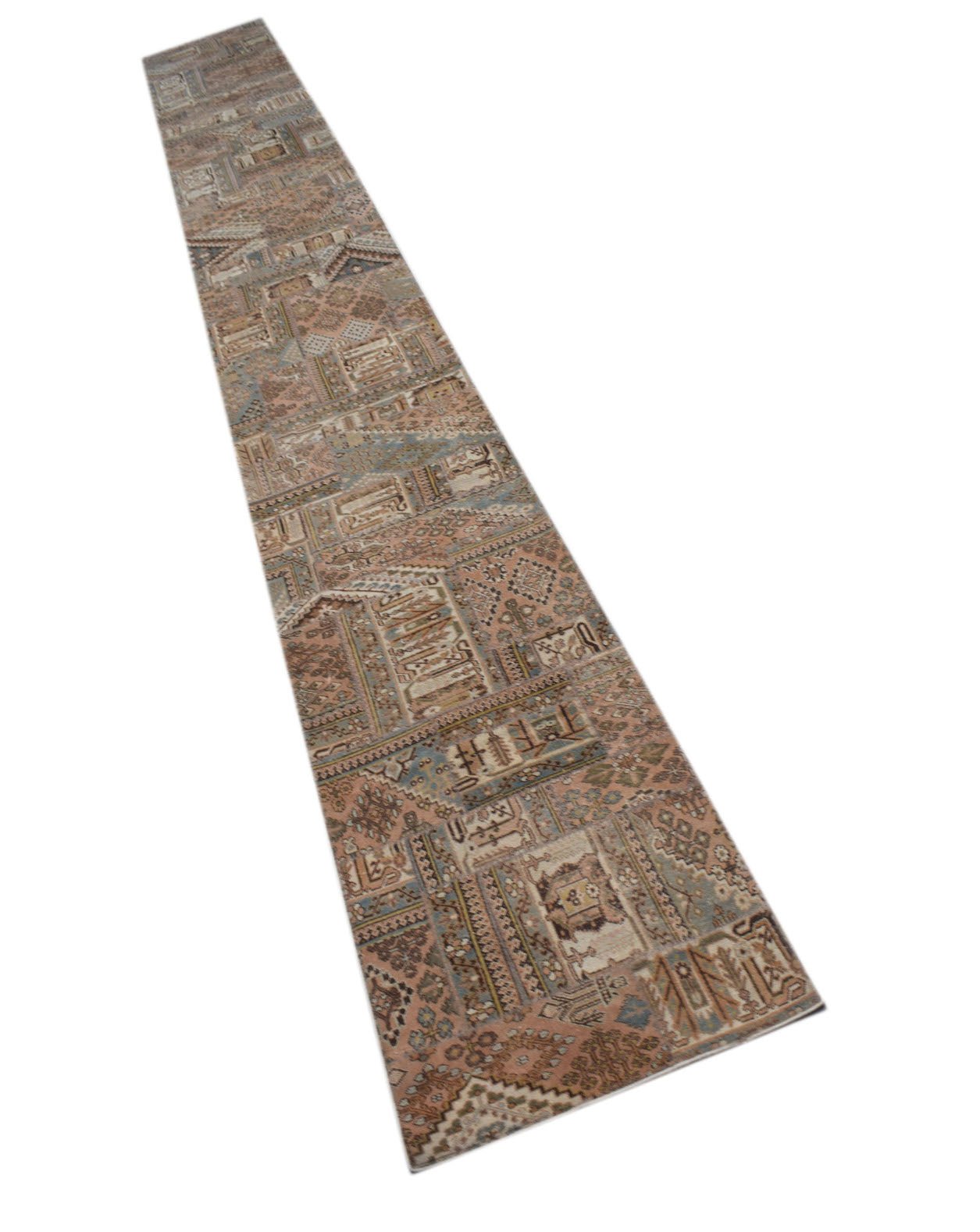 A long, handmade vintage patchwork runner rug featuring intricate patterns in muted earth tones.