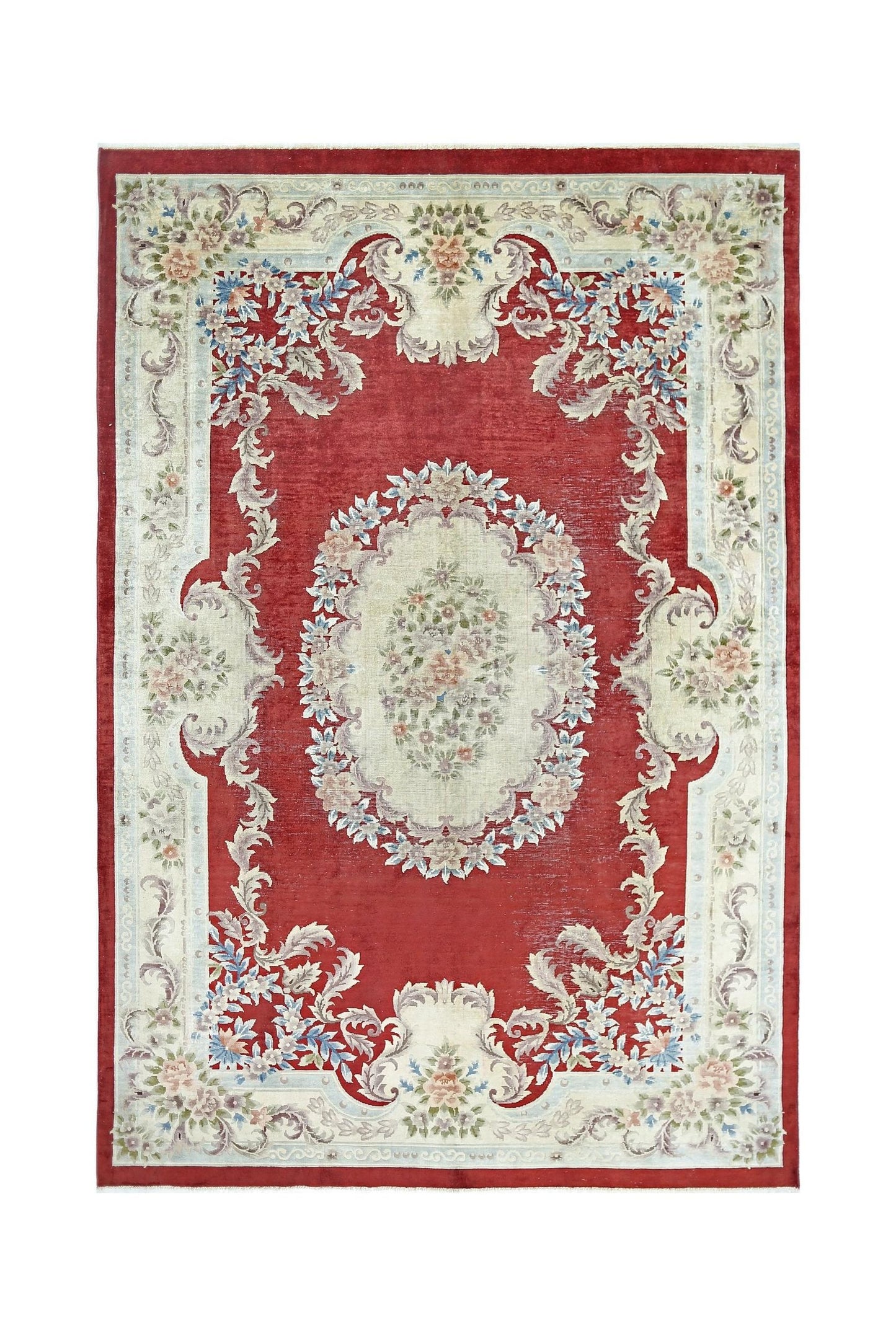 A vintage Chinese silk rug featuring a central floral medallion on a red field with ornate borders.
