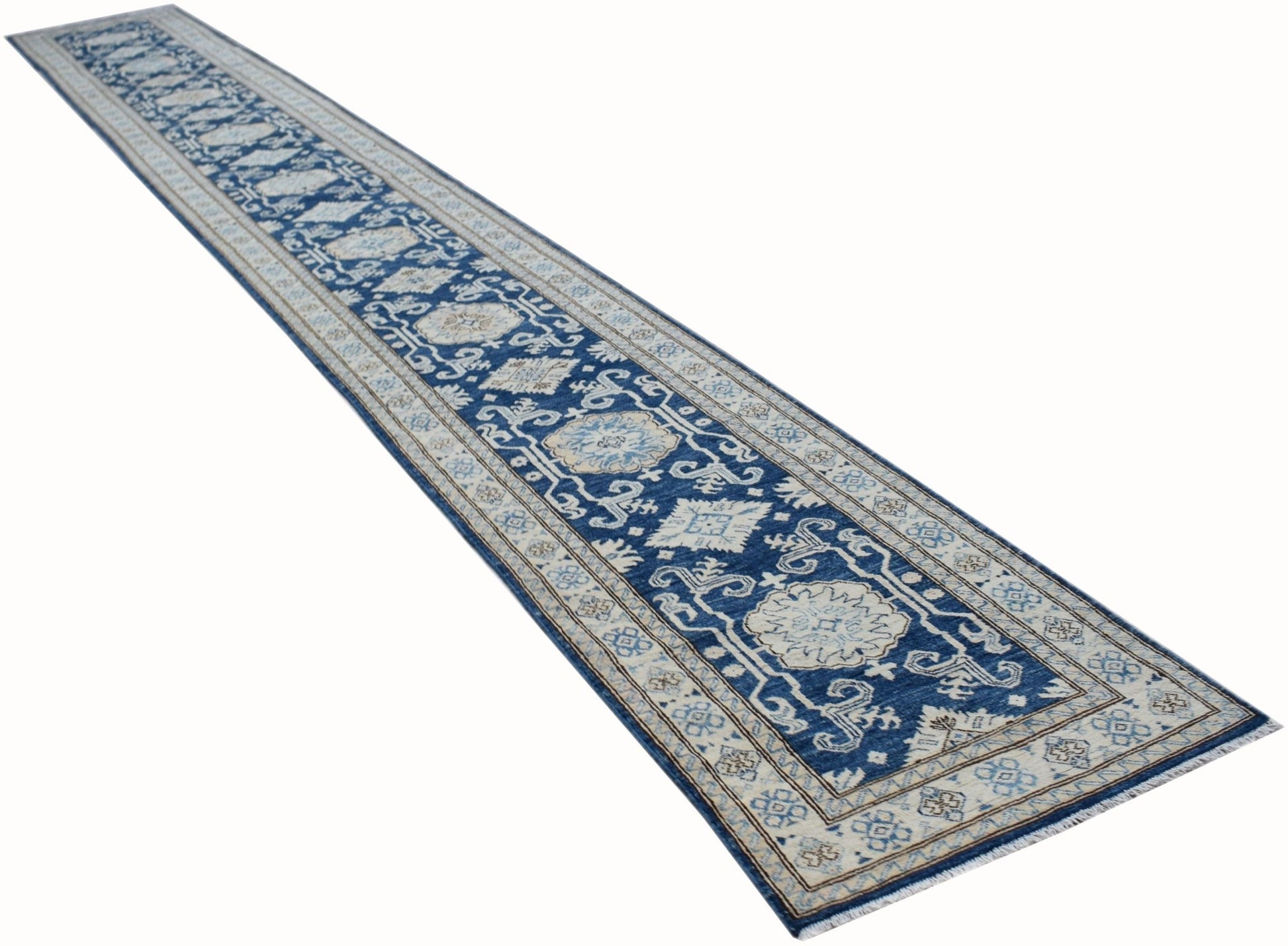 A long, handmade Afghan Super Kazakh runner rug featuring traditional blue and beige patterns.