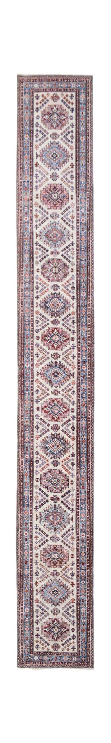 A long, handmade Afghan Super Kazakh runner rug featuring repeating geometric medallions in wool.