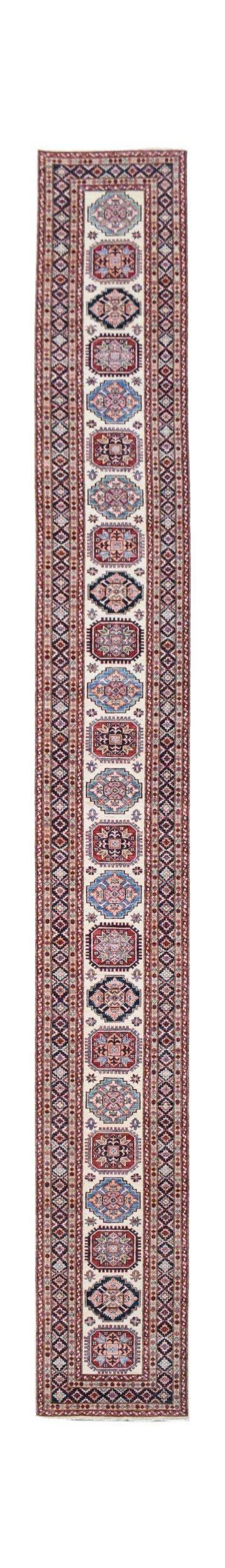 An Afghan Super Kazakh runner rug featuring repeating geometric medallions in red and blue.