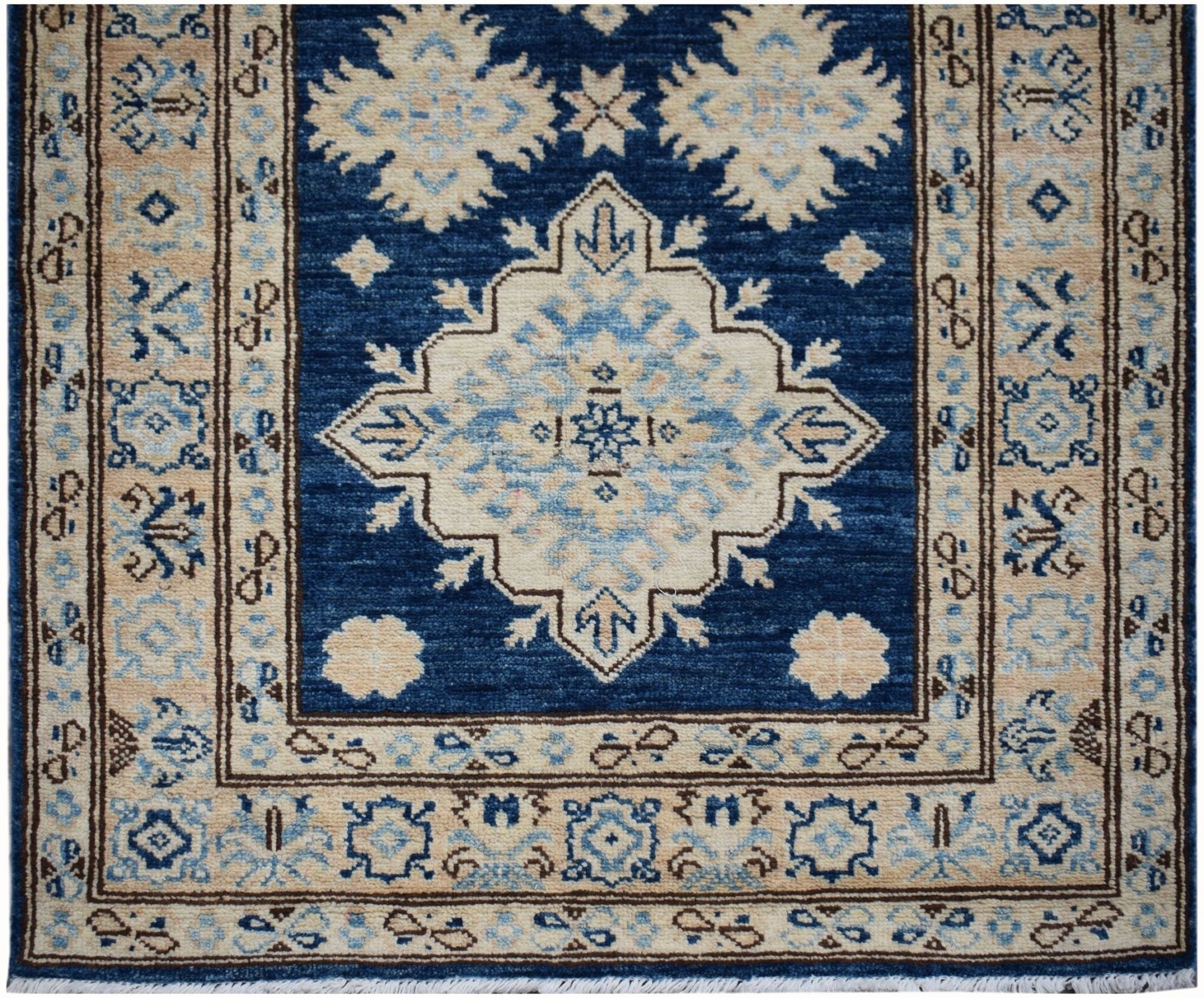 Handmade Afghan Super Kazakh runner rug featuring a blue field with beige geometric medallions.